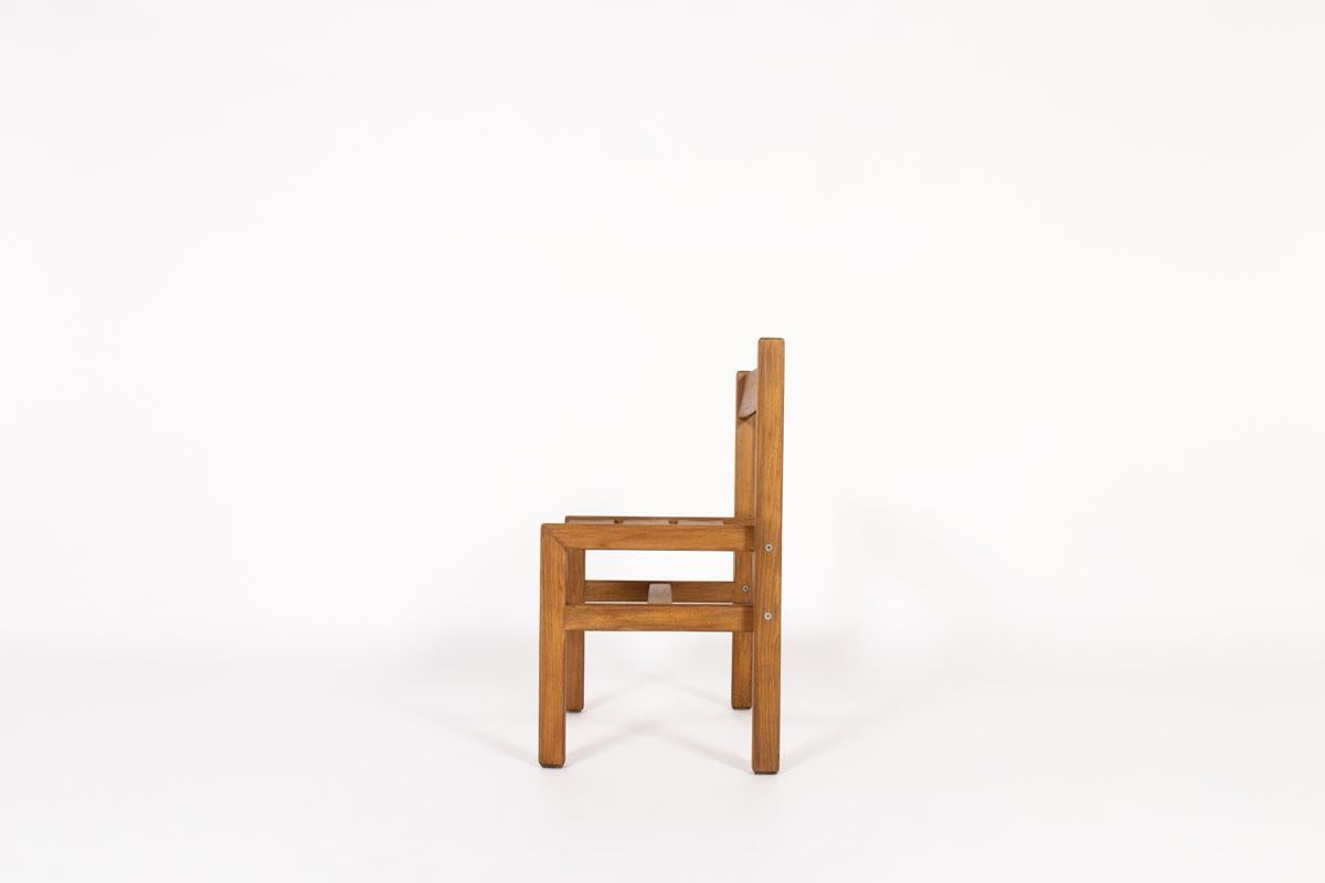 Chair designed and manufactured by the famous French cabinetmaker Andre Sornay in the 1960s. 
Composed of a solid beech structure assembled by the tigette system patented by the designer and became famous for it. The chair can be completely