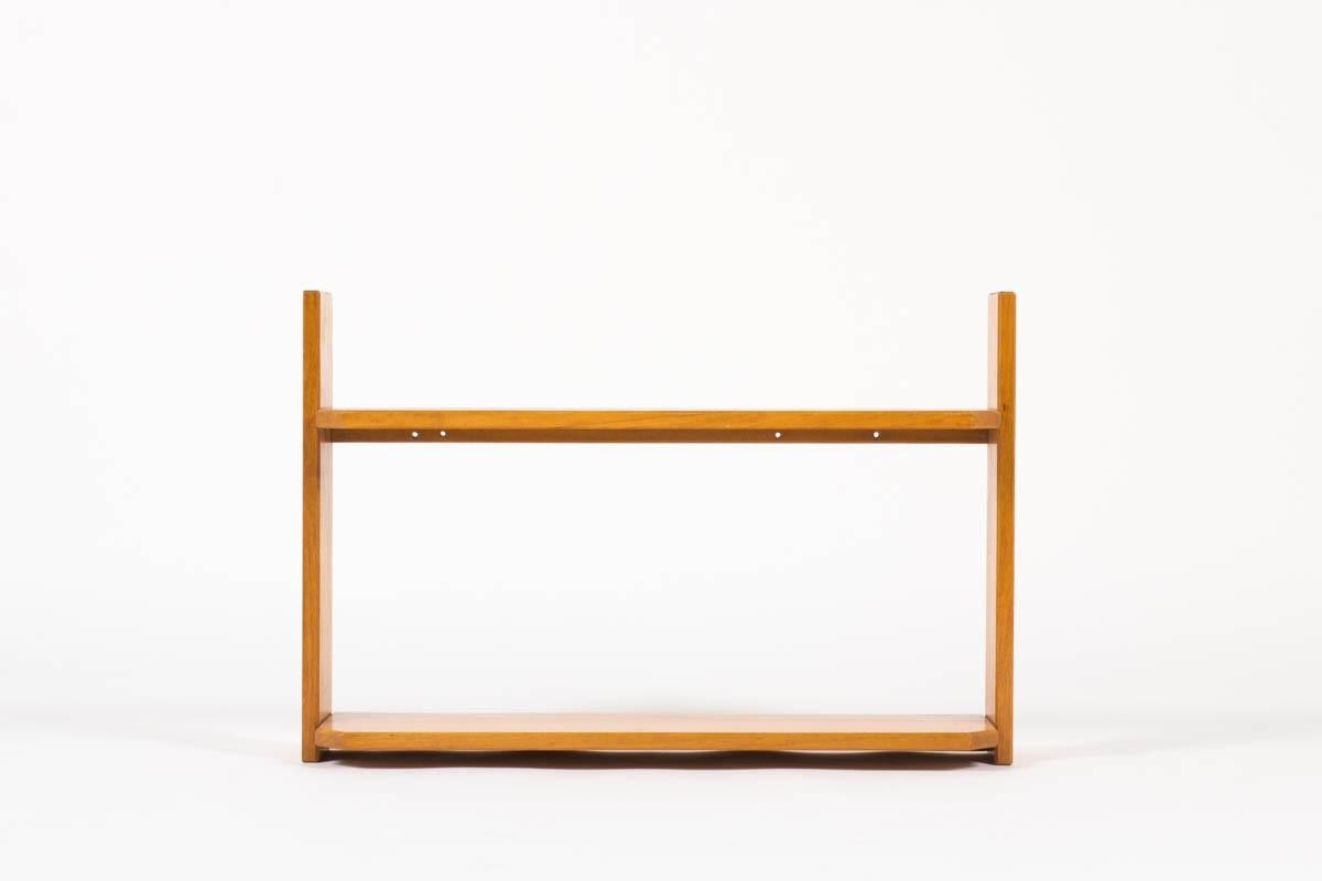 Shelf designed and manufactured by the famous french cabinetmaker Andre Sornay in the 1960s. 
Composed of a solid wood structure assembled with the tigette system patented by the design and make him famous.