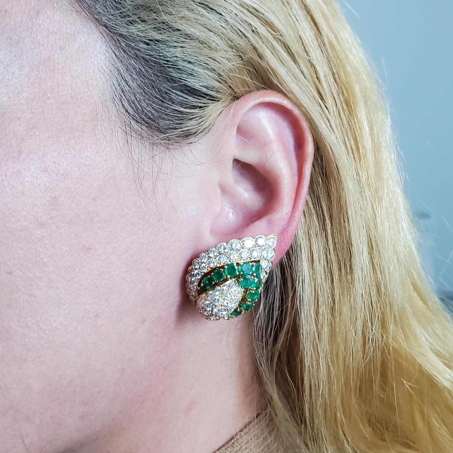 Pair of gem set earrings designed by Andre Vassort.

Exceptional pair of clip on earrings, created in Paris France at the atelier of the jeweler Andre Vassort. These classic pieces has been crafted in solid yellow gold of 18 karats and embellished