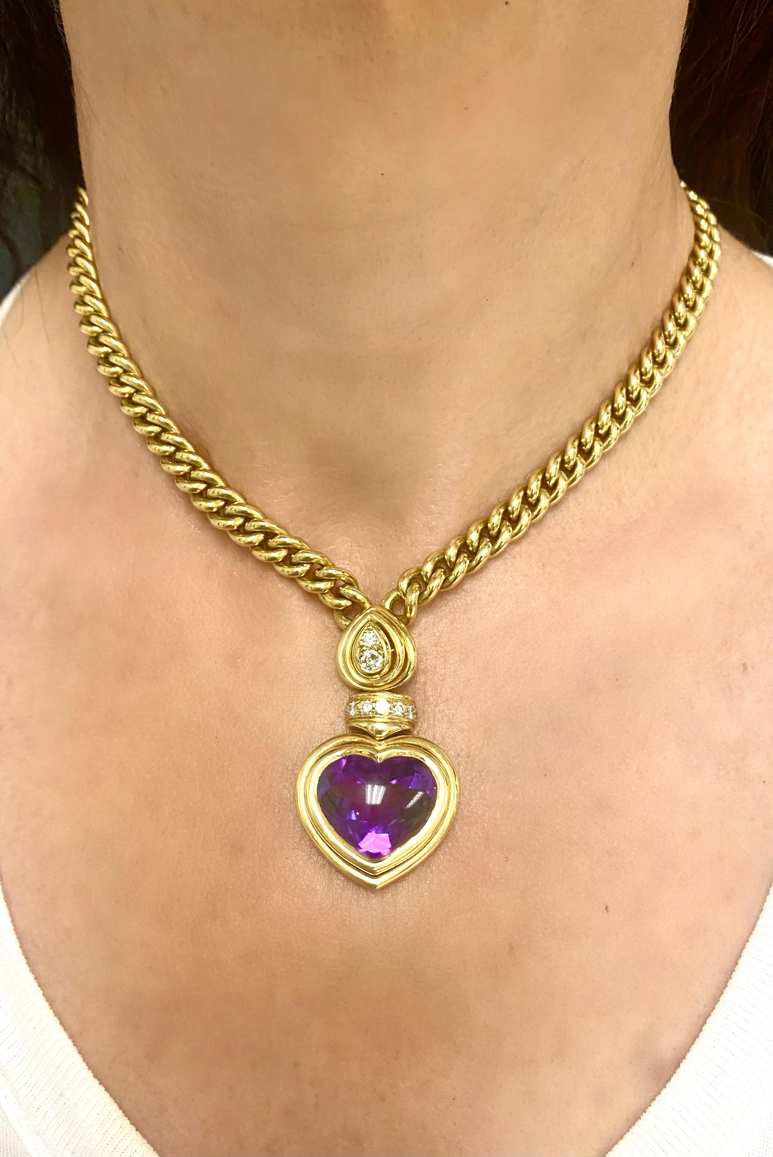 DESIGNER: Andre Vassort
CIRCA: 1980’s
MATERIALS: 18K Yellow Gold
GEMSTONE: Amethyst
WEIGHT: 105.9 grams
MEASUREMENTS: 15 x Heart Pendant  - 1 3/4” x 1”
HALLMARKS: 750

A stunning 18k gold necklace by Andre Vassort, featuring amethyst and diamonds.