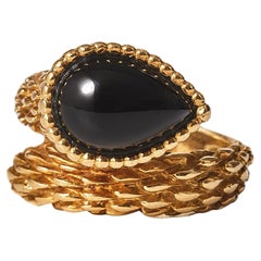 Anello Andre Vassort Serpent Bohème in onice e oro giallo 18 carati, circa 1970.