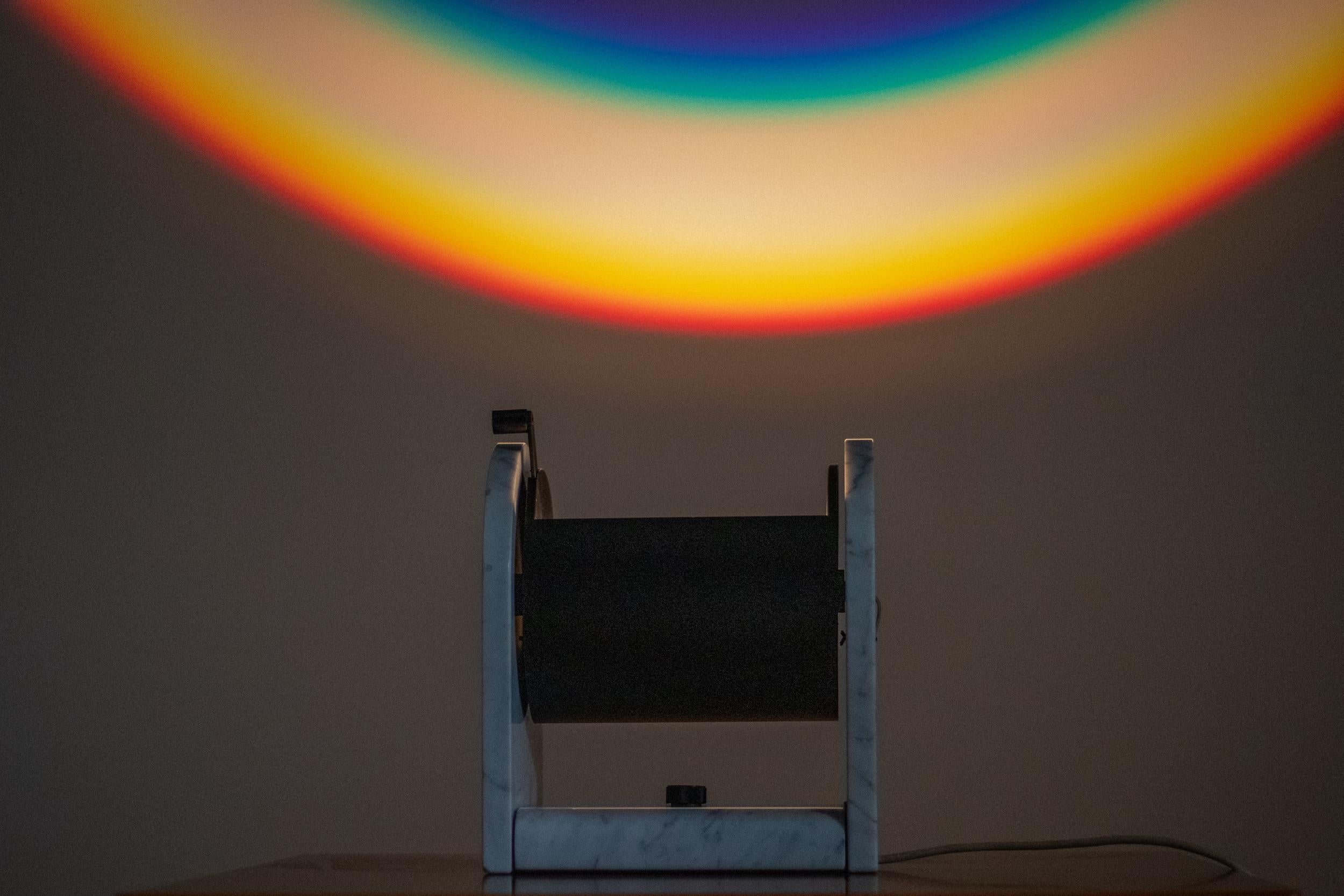 Exceptional Studio Alchimia Arc-en-Ciel lamp, designed by Andrea Belossi in 1979.  
The Arc-en-Ciel lamp is a wonderful example of the postmodern lighting, designed by Andrea Belossi for Studio Alchimia.  By Imitating a natural phenomenon it creates
