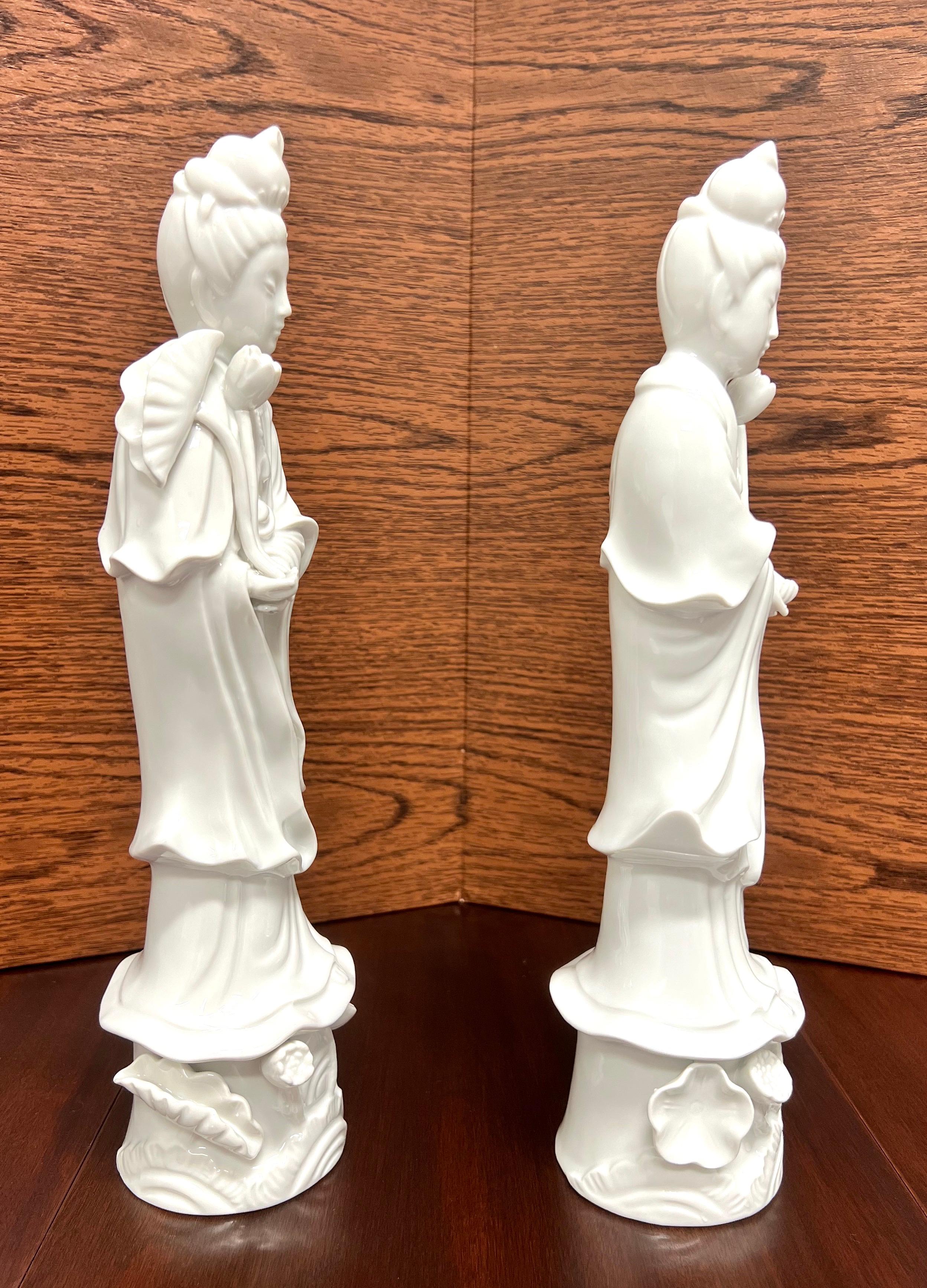 A pair of Asian Chinese Quan Yin Goddess of Mercy figurines by Andrea by Sadek. Hand painted, white in color glazed porcelain. Made in Japan, in the late 20th Century.

Measures:  Each: 4w 4d 14.5h, Weighs Approximately: 1 lb Each

Outstanding
