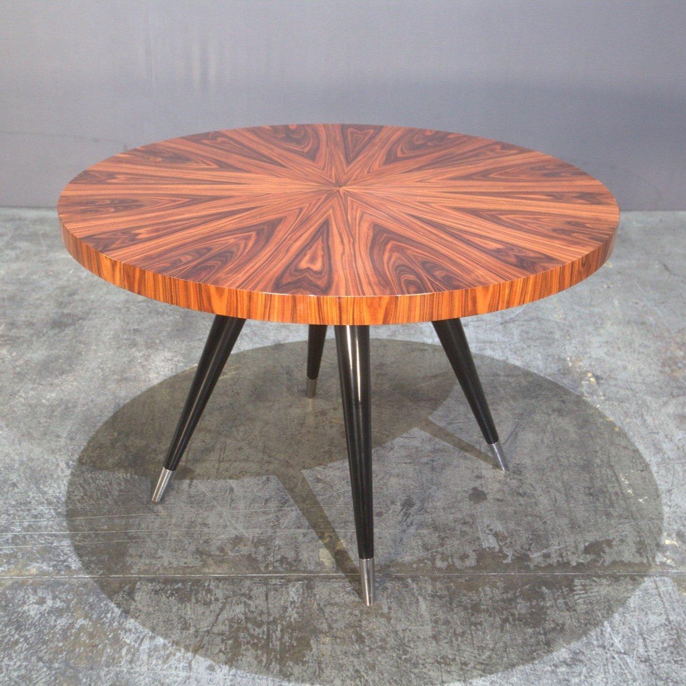 Elevate your dining experience with the Andrea Gloss Santos Extending Dining Table. Crafted with precision and elegance, this table features a glossy finish that adds a touch of sophistication to any dining space. Whether hosting a formal dinner