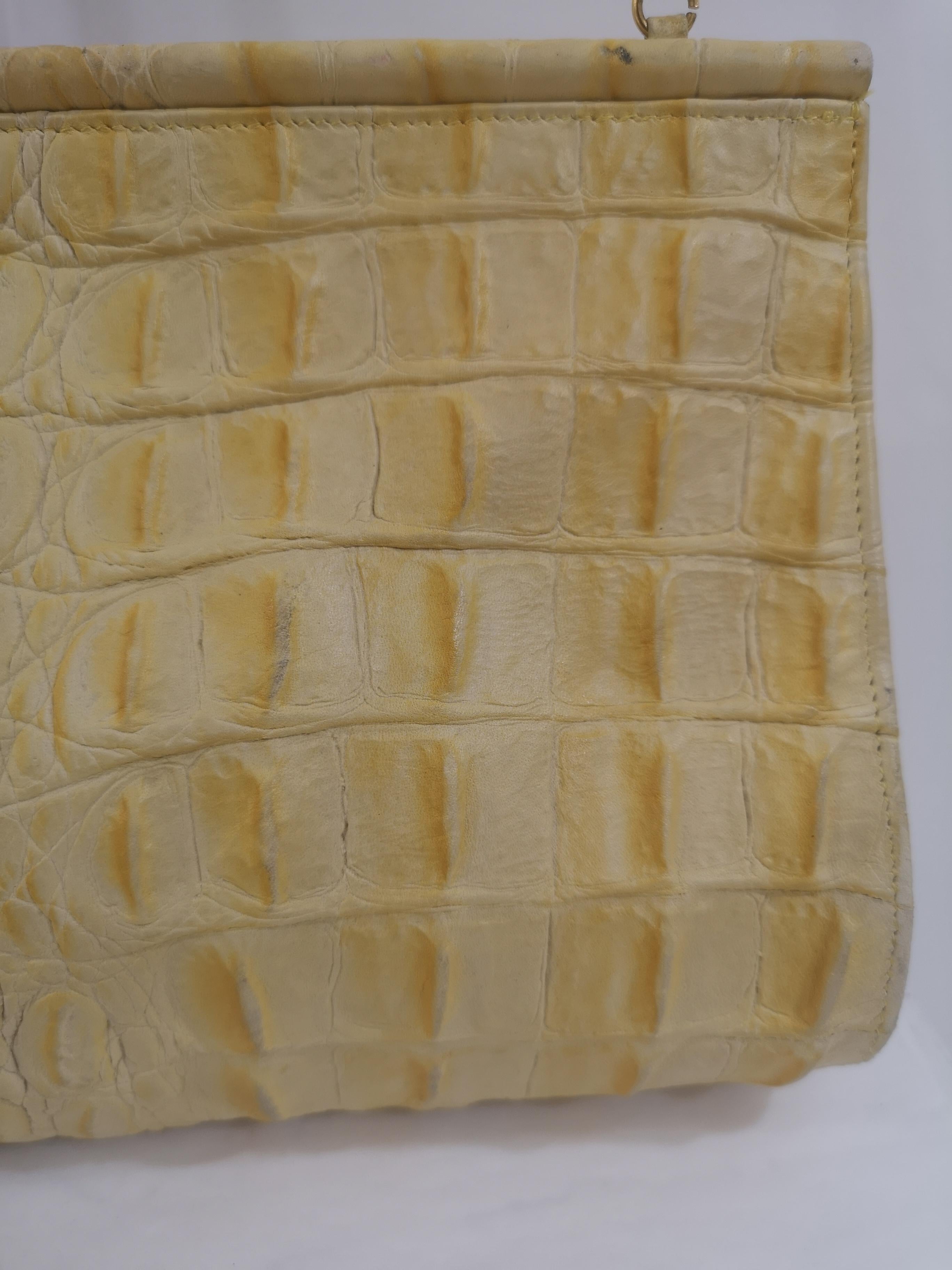 Andrea Pfister yellow crocodile shoulder bag
measurements: 30 * 17 cm * 6 cm depth