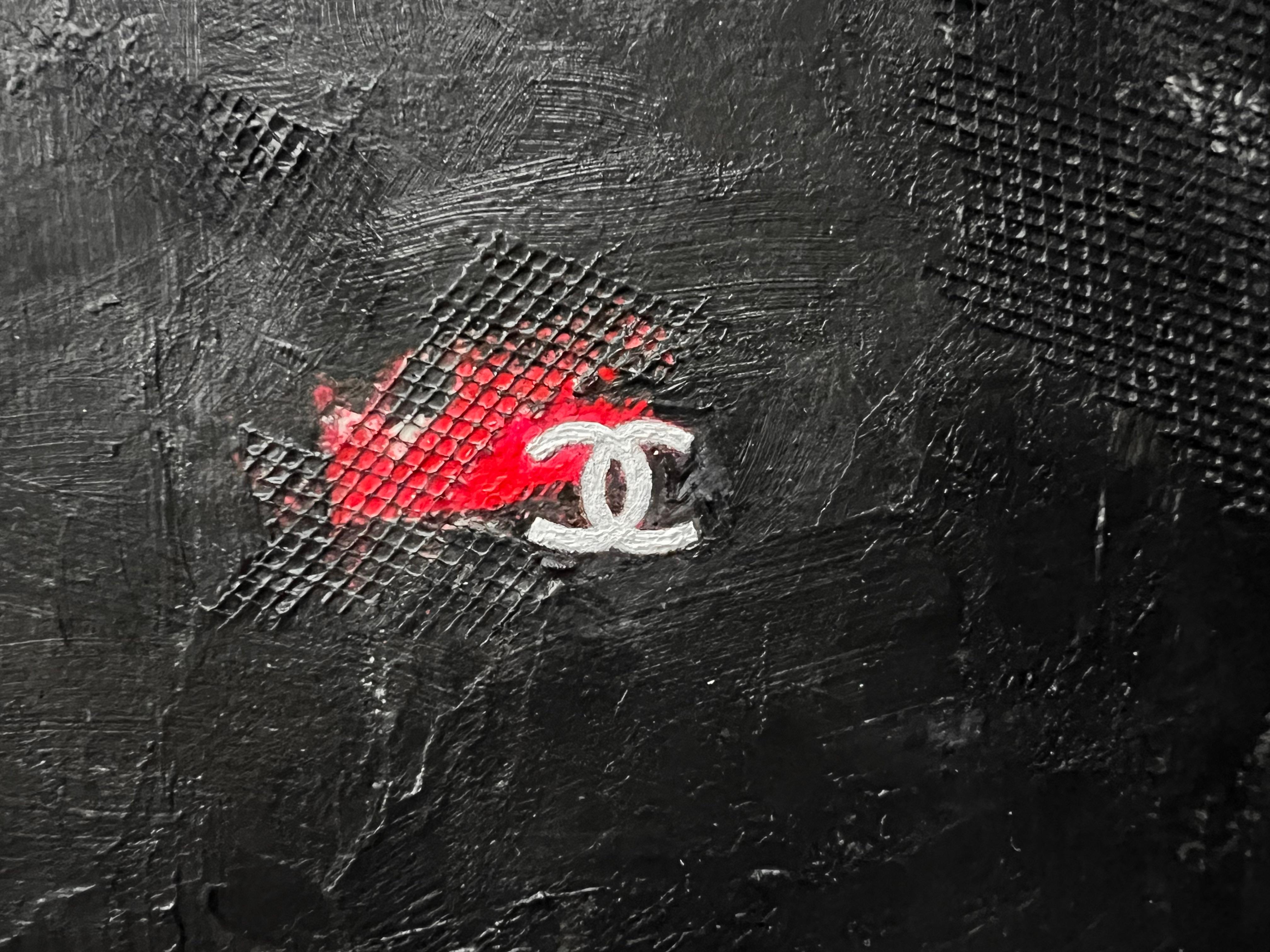 Homage to the iconic Chanel Brand. This original artwork on paper combines textured brush strokes and textile collage elements. Surrounded by heavy texture, the focal point is a detailed Chanel logo with a touch of red adding visual interest to the
