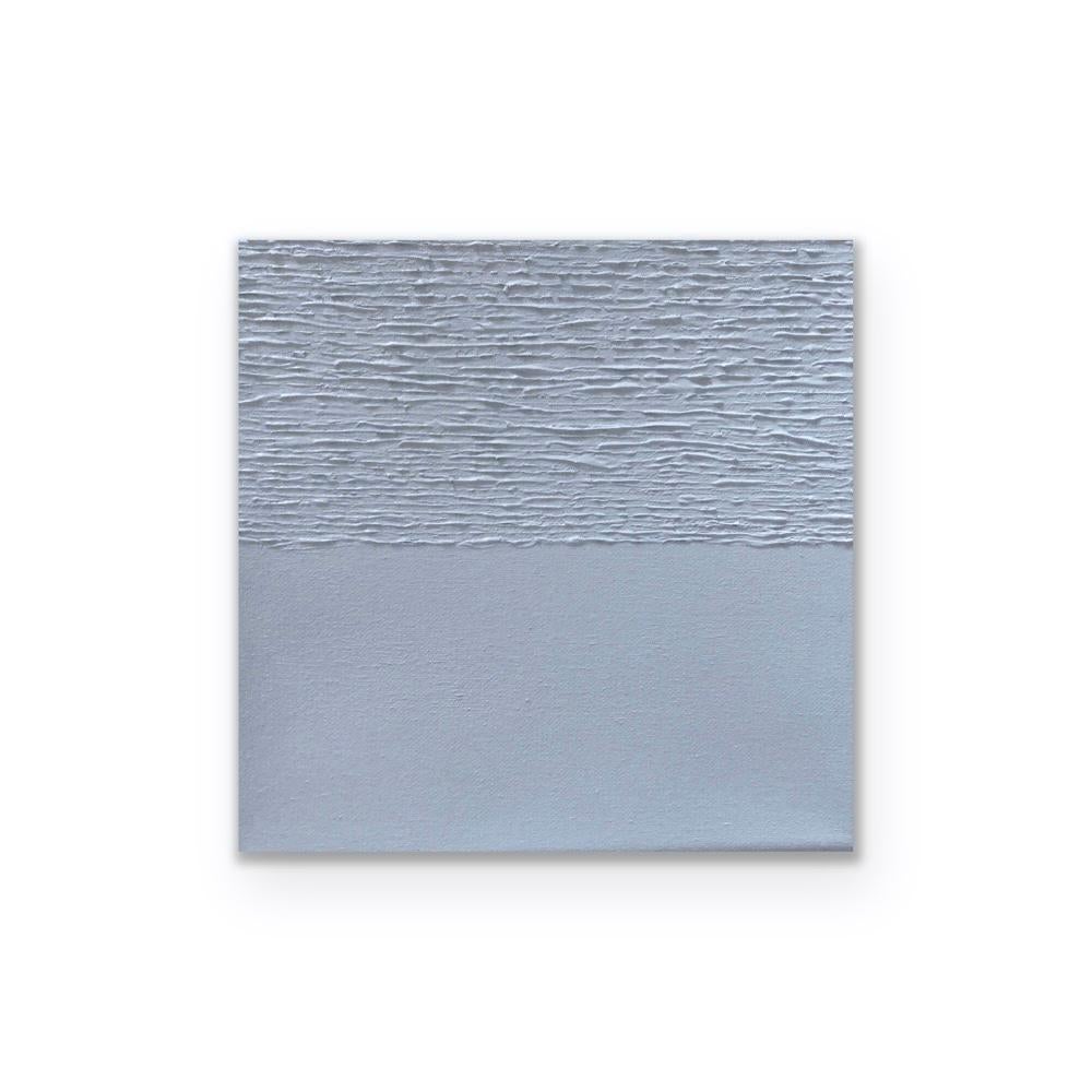This minimal abstract painting is a quiet shade of sky blue. The detailed texture creates movement offering a calming visual experience invoking a sense of tranquility. Small paintings are intimate and personal. They can be moved around easily and