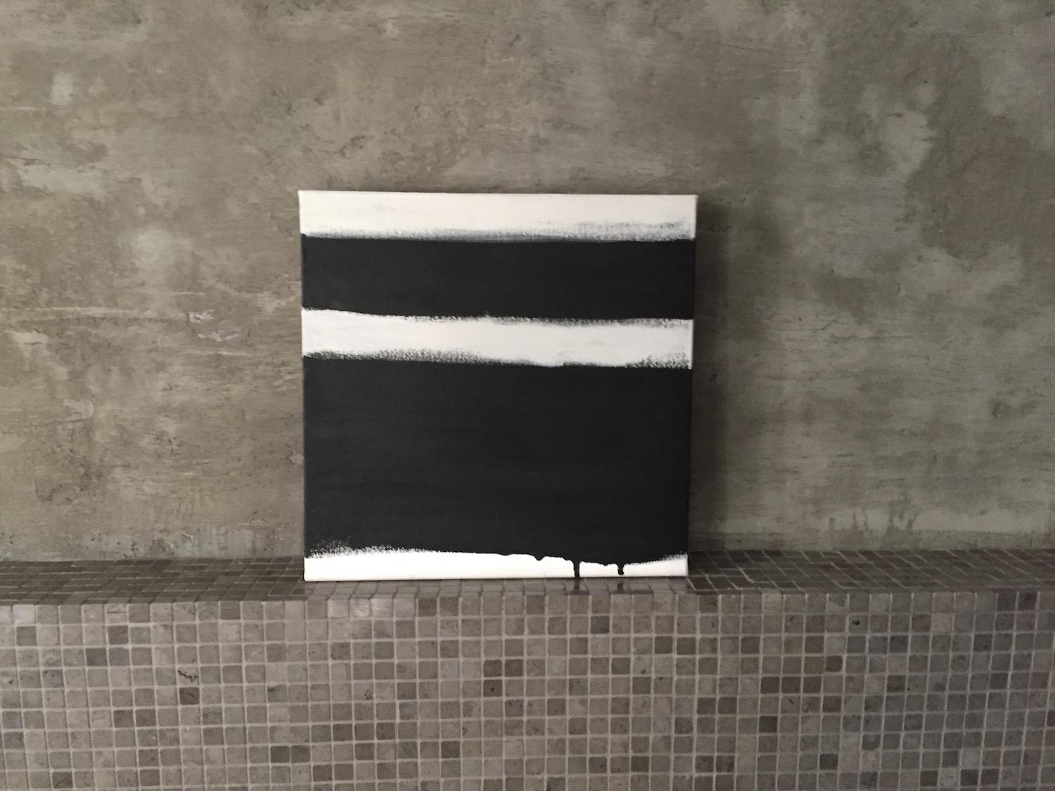 This modern, minimal painting on canvas places emphasis on simplifying the composition. Layers of paint build up a quiet texture in this understated yet visually commanding artwork. 
(Black, off white and white)

To view more of Stajan-Ferkul's