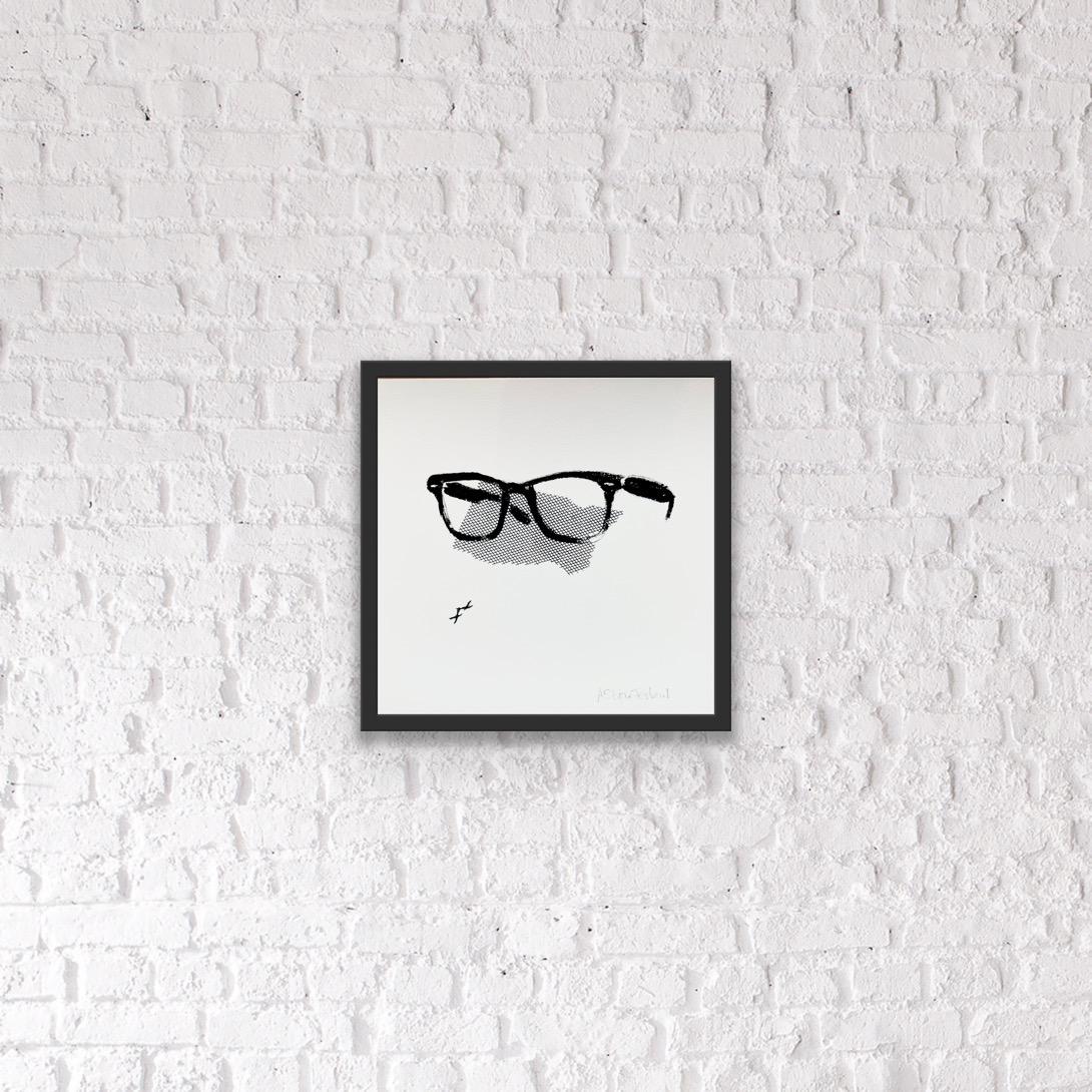 An eye for detail. Homage to the iconic Ray-Ban style glasses. This unique, one-of-a-kind giclèe print is printed on archival, acid-free, cold press paper. Giclèe prints are high quality reproductions. Hand signed in pencil. The perfect accent piece