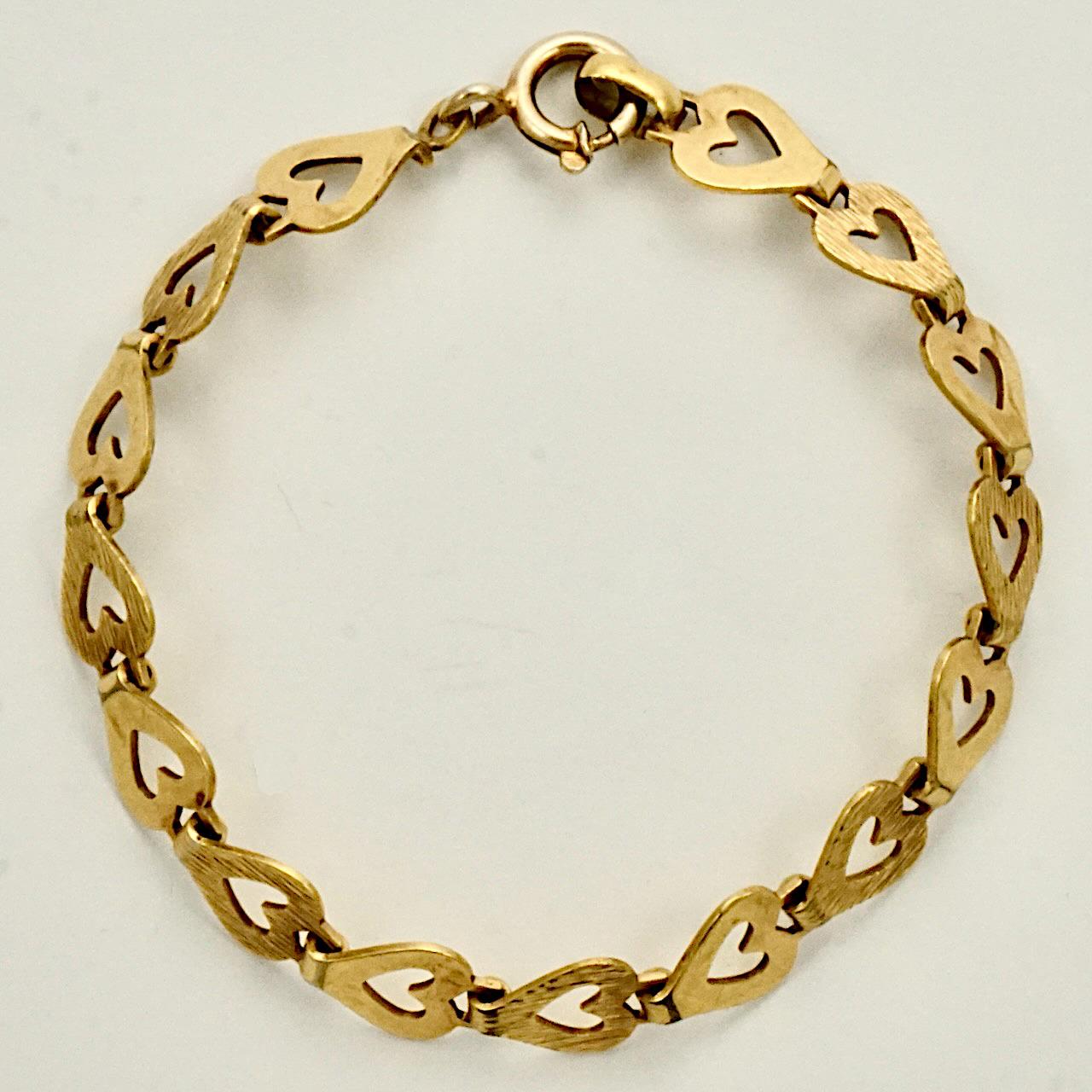 Women's or Men's Andreas Daub Gold Plated Open Heart Textured and Shiny Link Bracelet For Sale
