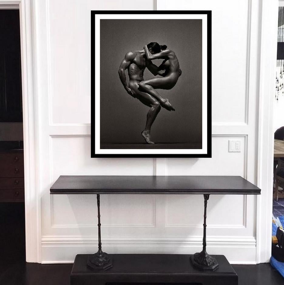 Sina&Anthony, Vienna - douple nude in athletic pose, fine art photography, 1995 - Black Figurative Photograph by Andreas H. Bitesnich
