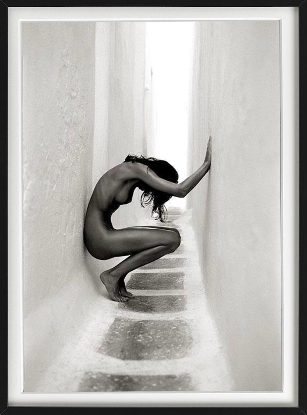 'Ulrica Mykonos II' - nude between white walls, fine art photography, 1996 - Gray Black and White Photograph by Andreas H. Bitesnich