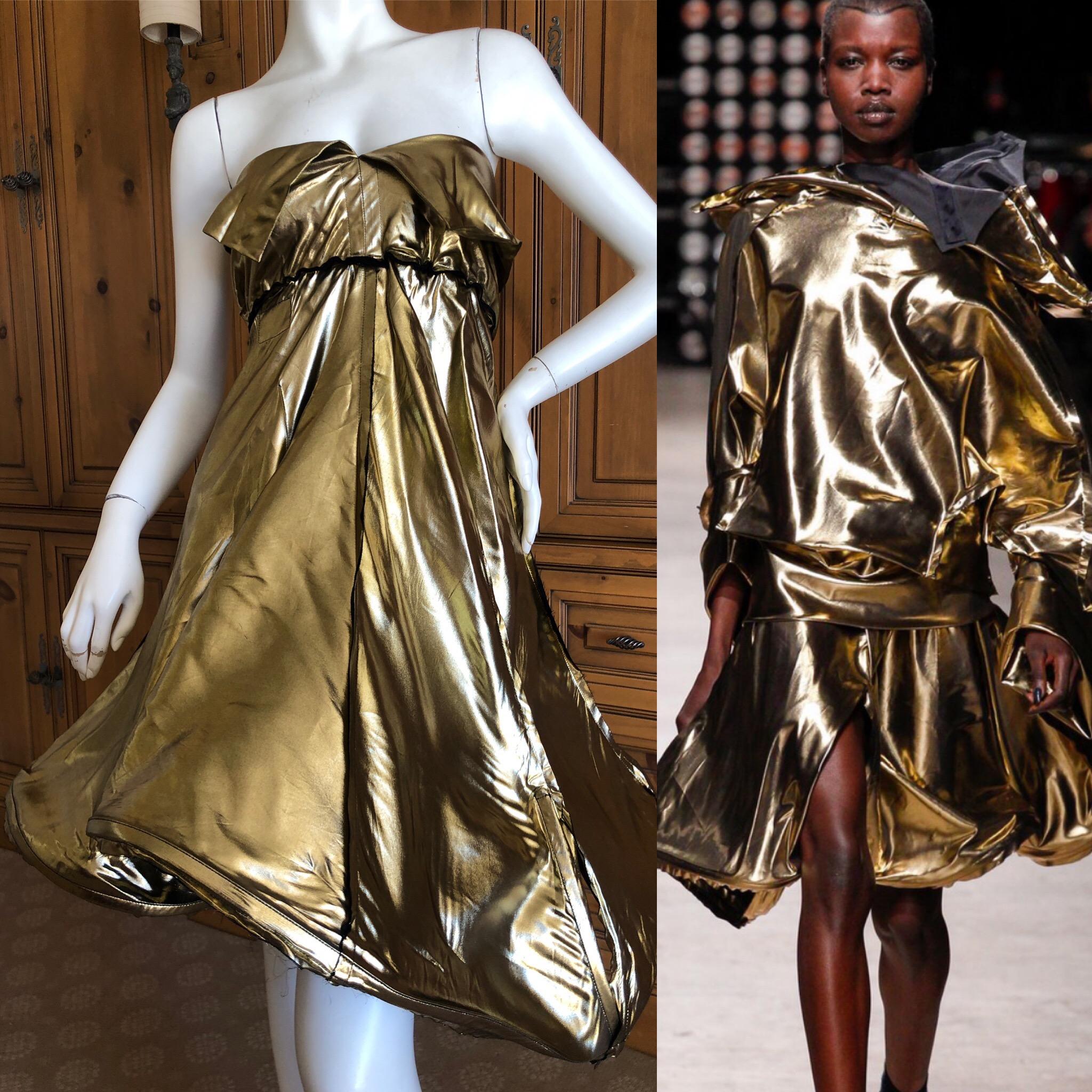 Andreas Kronthaler for Vivienne Westwood 2016 Gold Lame Skirt or Dress.
Wired in the hem for a 3D effect.
I think this is a skirt, with a very stretchy elastic waist, but I also styled it as a dress by clipping it on the back.
There is a lot of