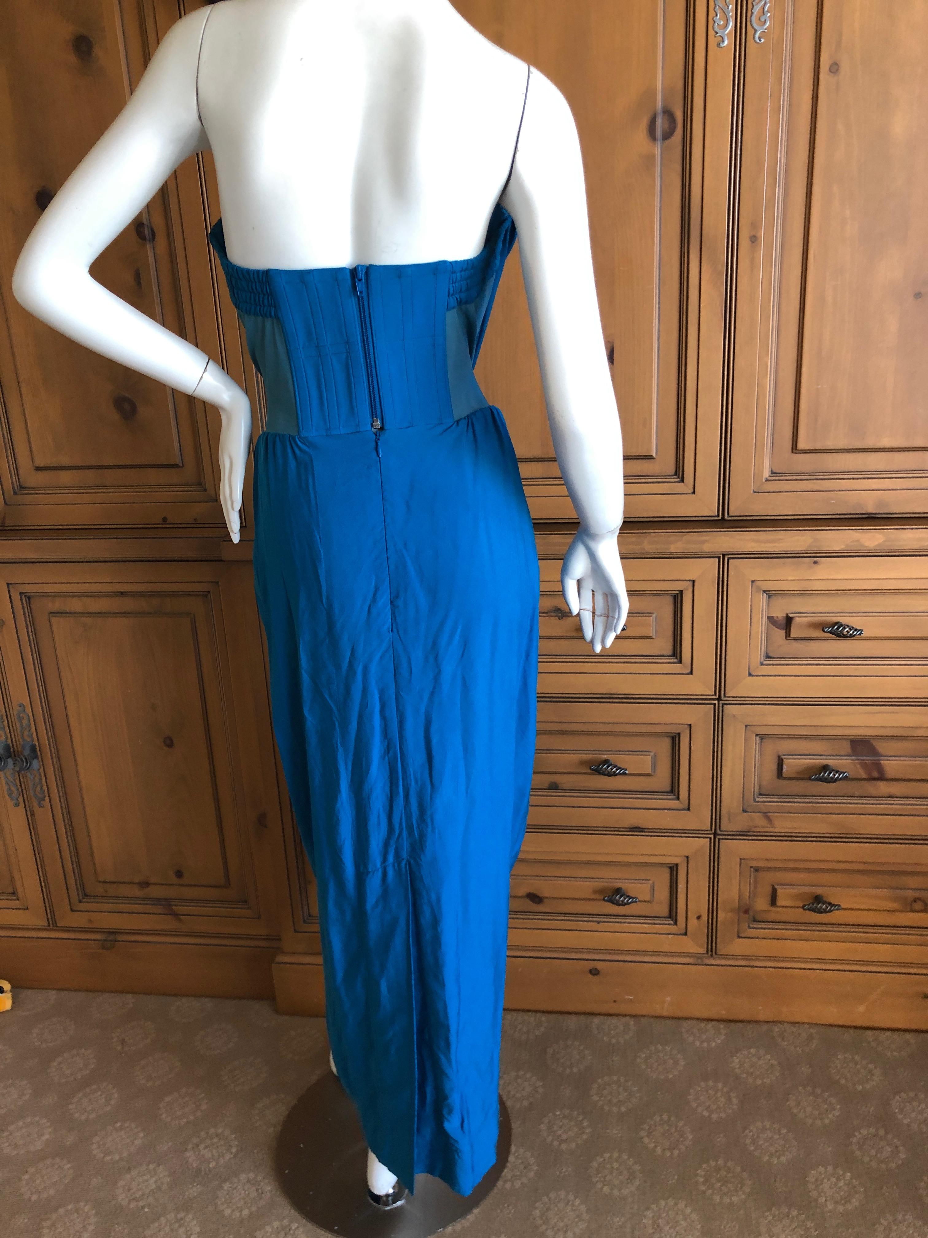 Andreas Kronthaler for Vivienne Westwood Blue Evening Dress with Built In Corset.
There is a full inner corset, see photo's .
There is a lot of stretch in this fabric.
Size 12 UK
Bust 36