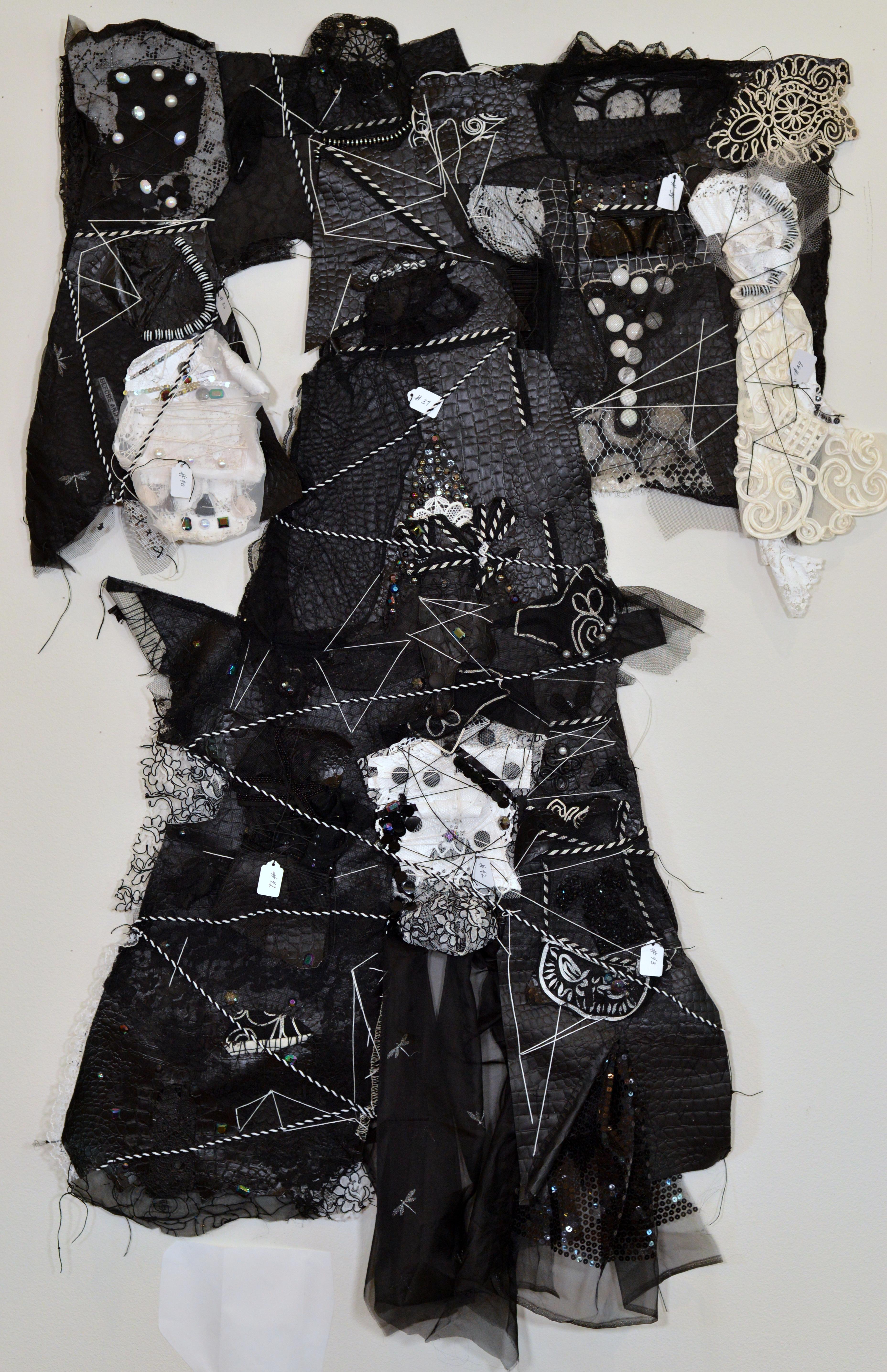 Remnants 5, Medium black and white dress with 7 small dresses sewn on - Mixed Media Art by Andrée Carter