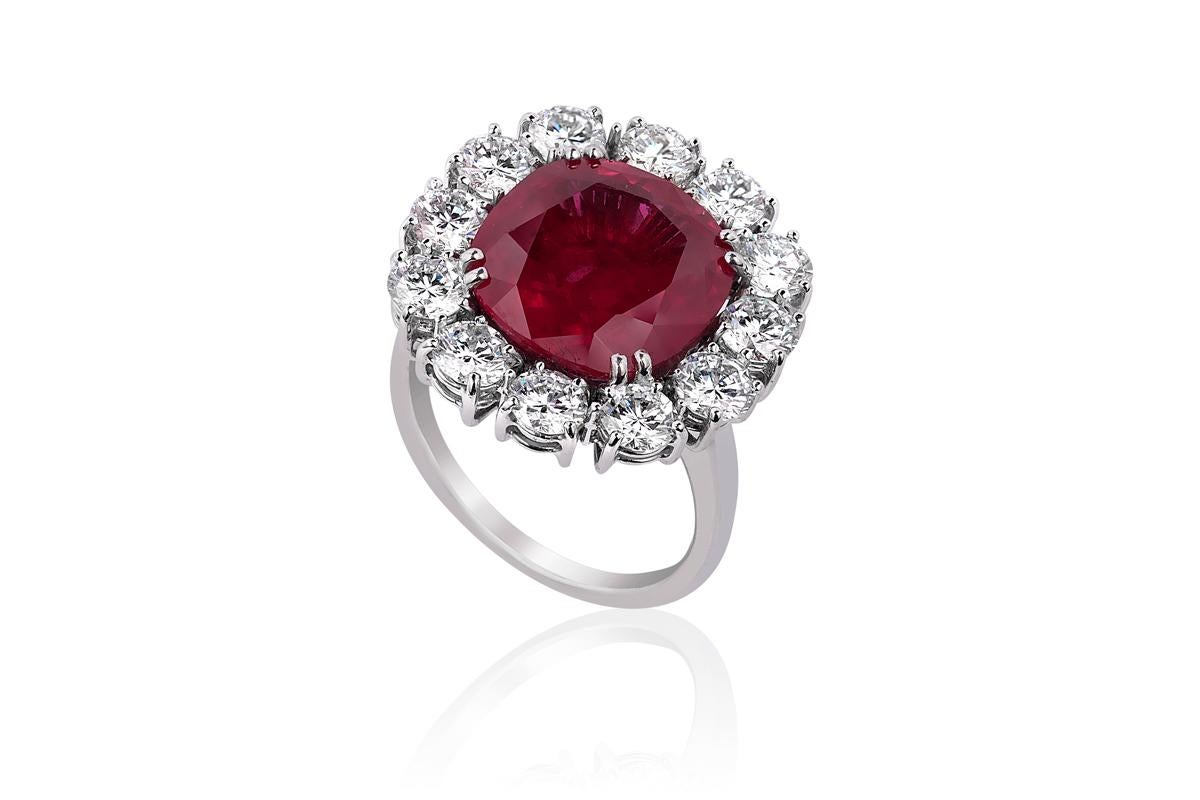 Andreoli 10.05 Carat Burma Ruby CDC Certified Diamond Engagement Ring 18k Gold

This Andreoli ring features:

3.38 Carat Round Brilliant Diamond (F-G-H Color, VS-SI Clarity)
10.05 Carat Ruby Certified by CDC Switzerald Gemology Lab Burma