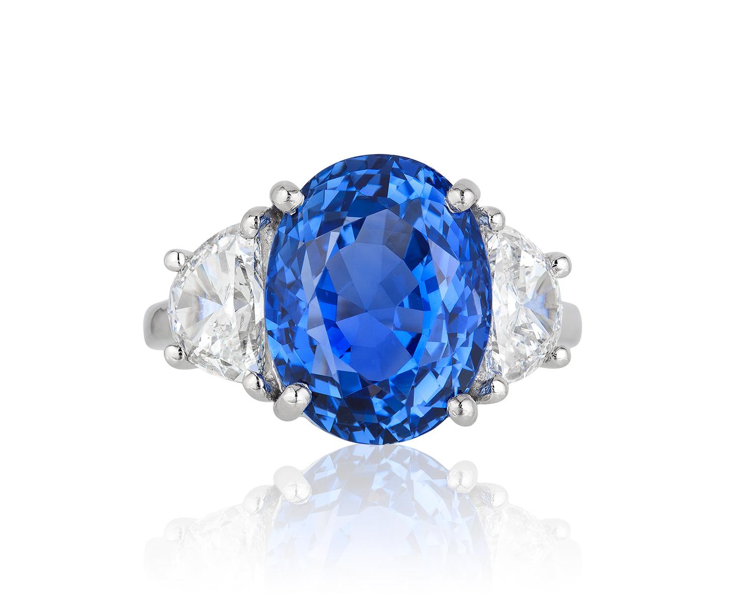 Andreoli 11.46 Carat No Heat Ceylon Sapphire Diamond Platinum Ring CDC Certified

This ring features:
- 1.56 Carat Diamond
- 11.46 Carat Sapphire
- 10.64 Gram Platinum
- Made In Italy
