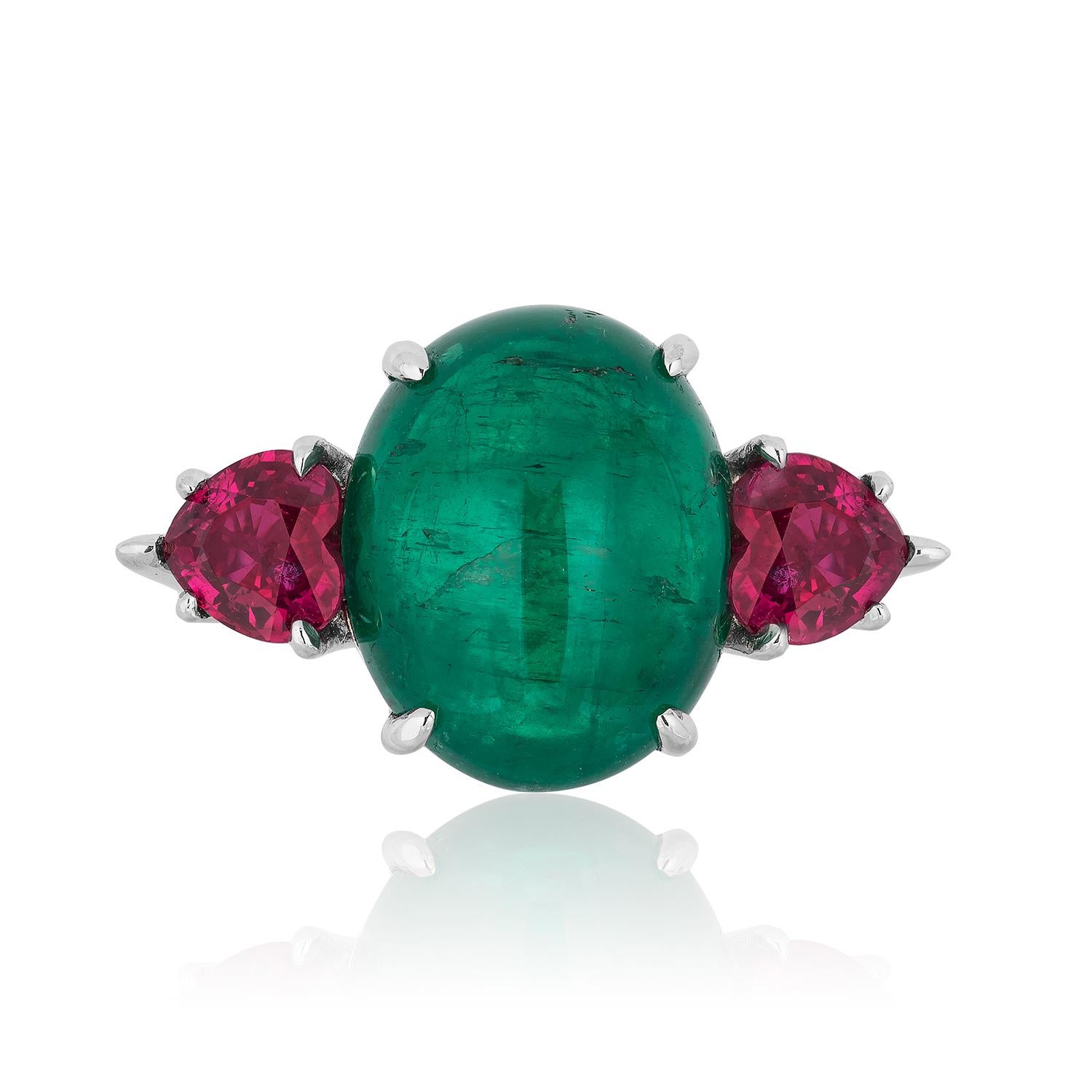 Andreoli 12.16 Carat Cabochon Colombian Emerald and Ruby Ring Platinum CDC Cert

This Andreoli ring features:

2.01ct Pair of Heart Shaped Rubies
12.16ct Emerald Colombian Cabochon CDC Certified
11.56gm Platinum

Made in the USA