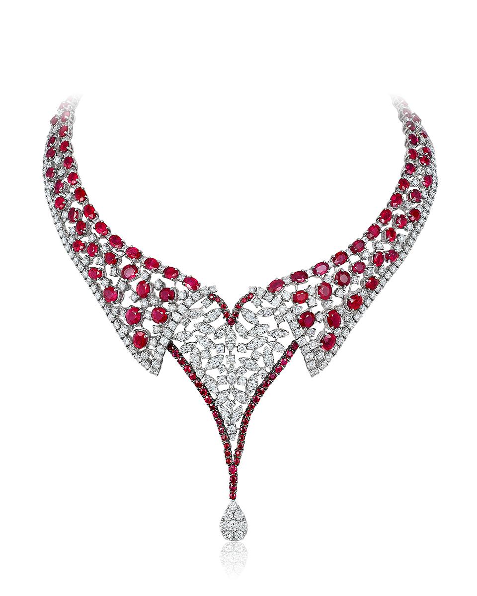 Andreoli 56.81 Carat Ruby Diamond 18 Karat White Gold Necklace

This necklace features:
- 24.05 Carat Diamond
- 56.81 Carat Ruby
- 105.70 Gram 18K White Gold
- Made In Italy