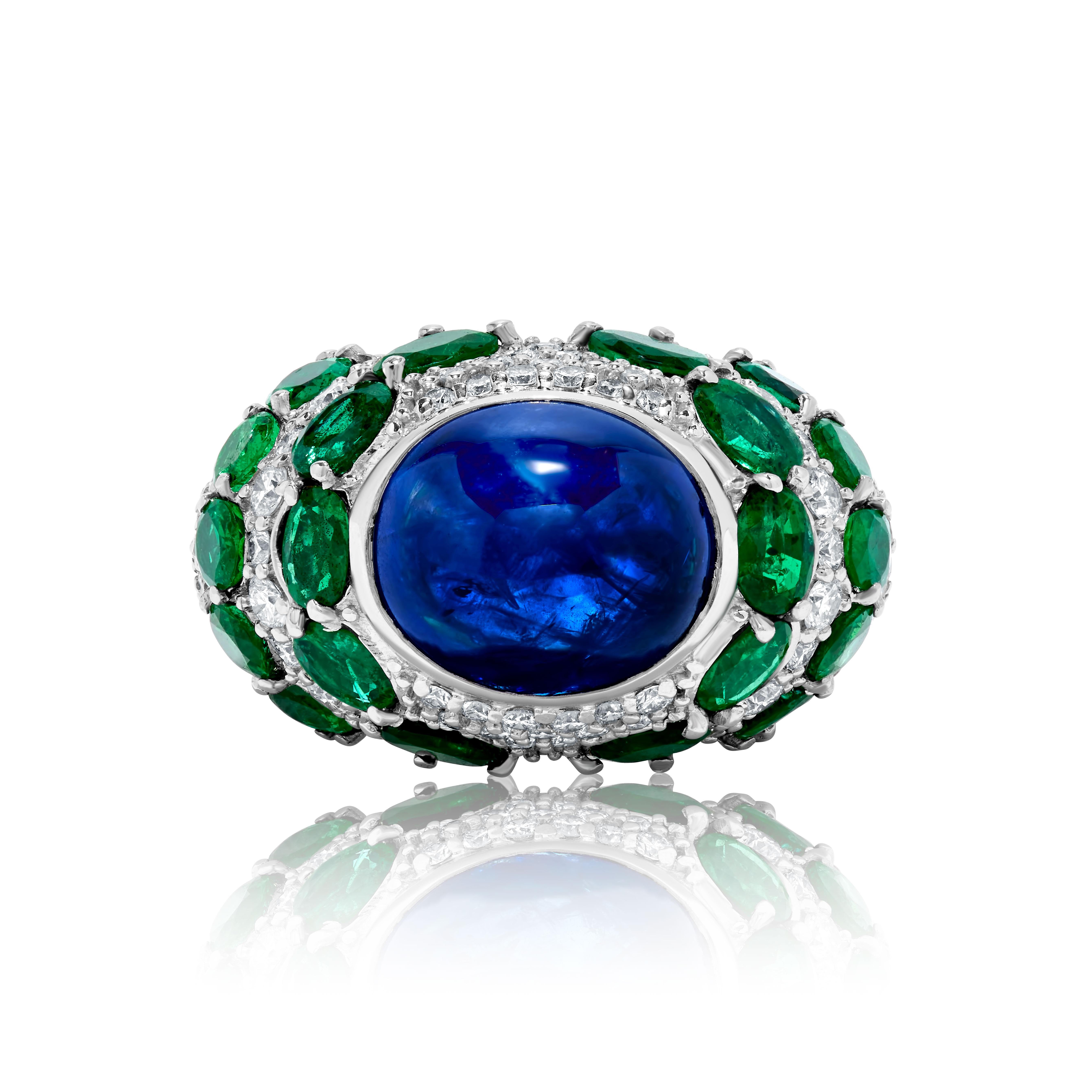 Andreoli Blue Sapphire Cabochon Ceylon Cert Emerald Diamond 18K White Gold Ring

This ring features:
- 1.36 Carat Diamond
- 5.07 Carat Emerald
- 12.50 Carat Blue Sapphire Cabochon Ceylon Certified
- 18.03 Gram 18K White Gold
- Made In Italy