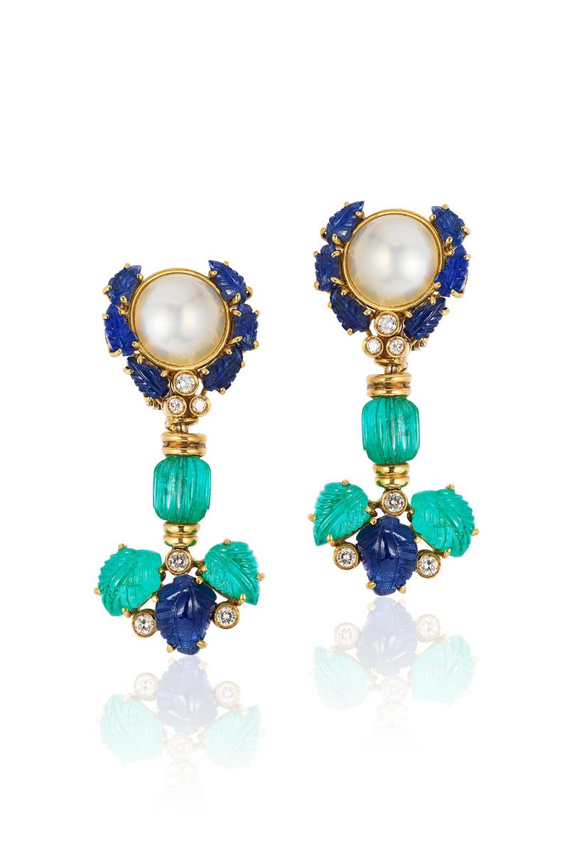 Andreoli Carved Emerald Sapphire Pearl Diamond 18 Karat Yellow Gold Earrings

These earrings feature:
- 29.33 Carat Emerald
- 25.95 Carat Sapphire
- 1.10 Carat Diamond
- 7.00 Gram Pearl
- 34.02 Gram 18K Yellow Gold
- Made In Italy