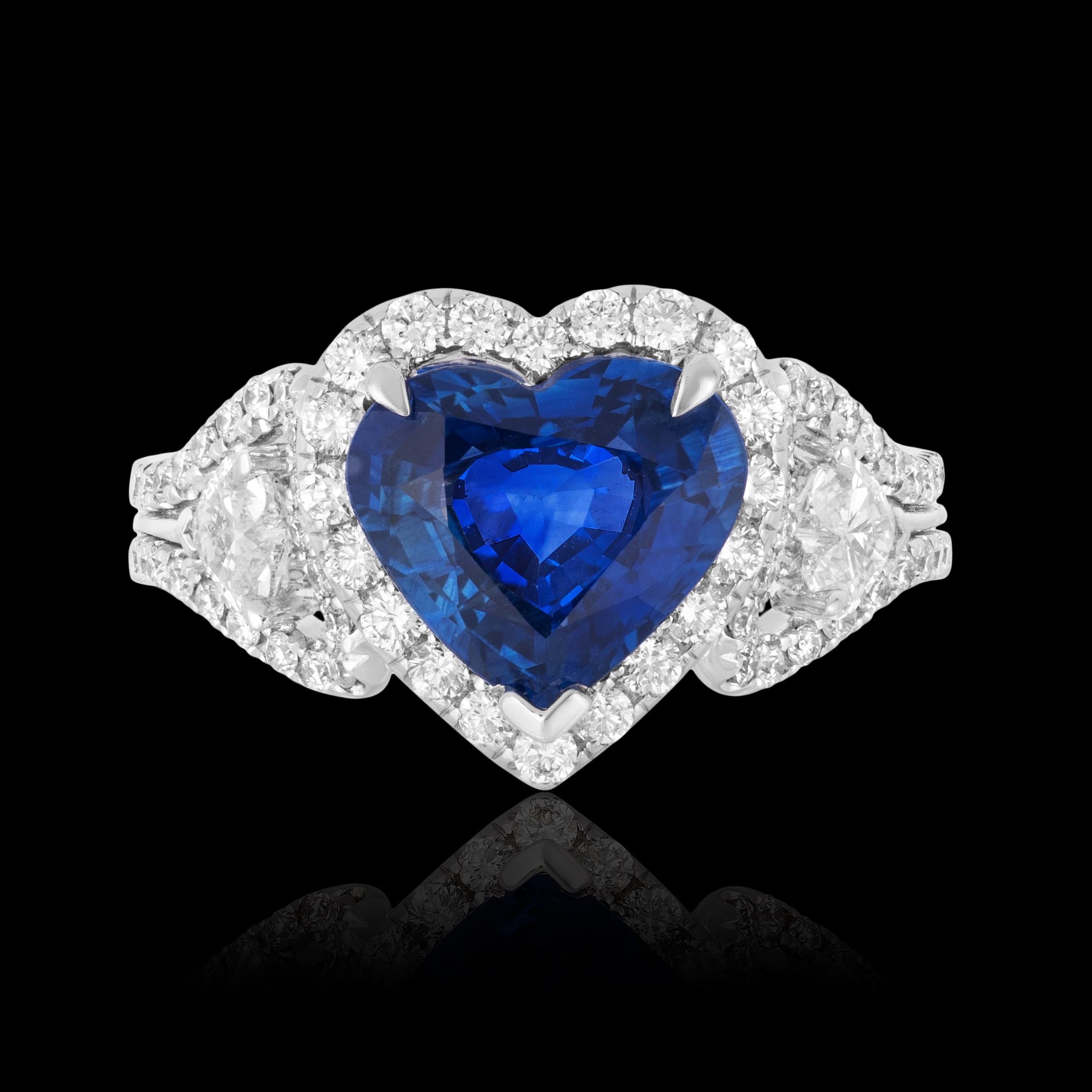 Andreoli CDC Certified 2.60 Carat Ceylon Blue Sapphire Diamond Heart Shape Ring

Features:

1.00 carat total weight of numerous near colourless round brilliant cut diamonds and two heart shape side diamonds.
2.60 carat Cornflower blue sapphire heart