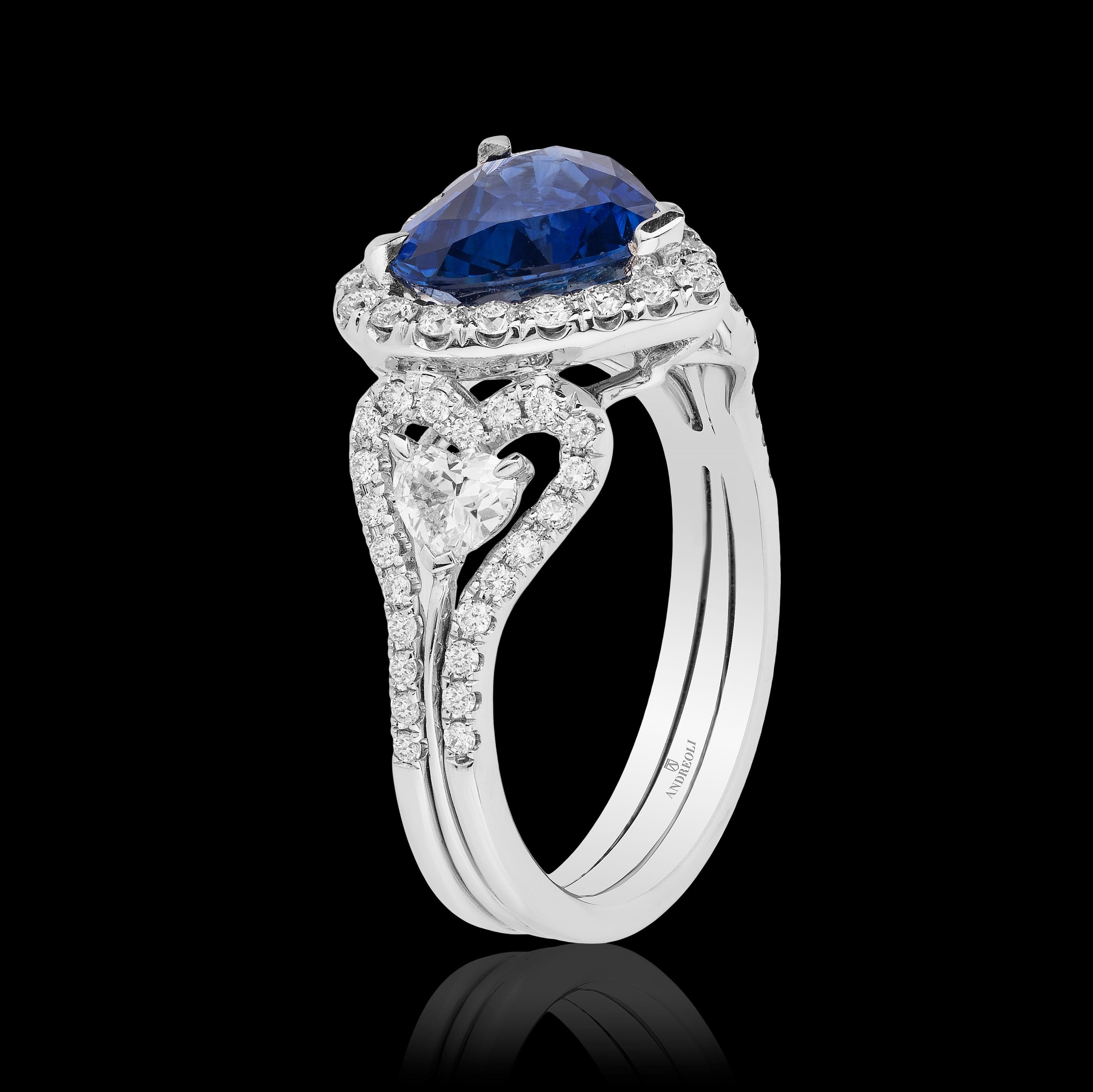 heart shaped diamond ring with blue sapphire