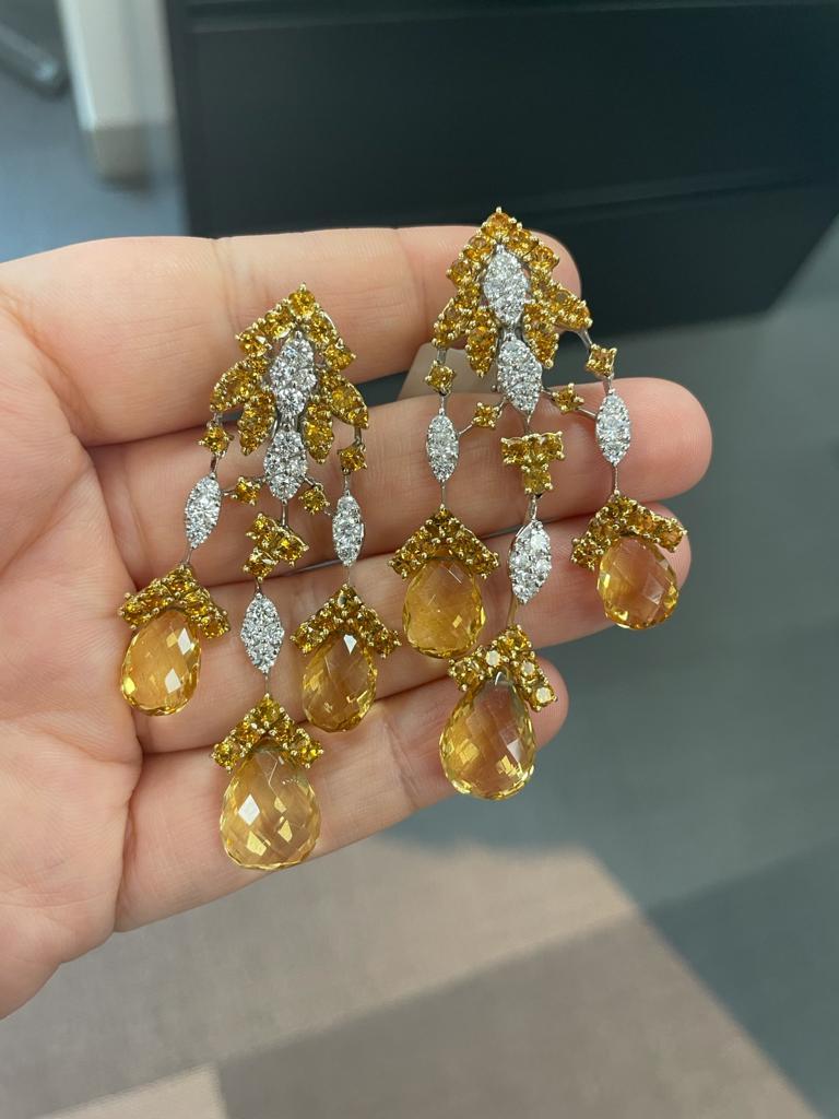 Andreoli Citrine And Diamond Chandelier Earrings set in 18K gold 

These unique chandelier earrings are a perfect summer accessory! 
They feature : 

2.94 Carat Round Diamonds
42.31 Carat Citrine Total
28.60 Gram 18K White and Yellow Gold 

Made In