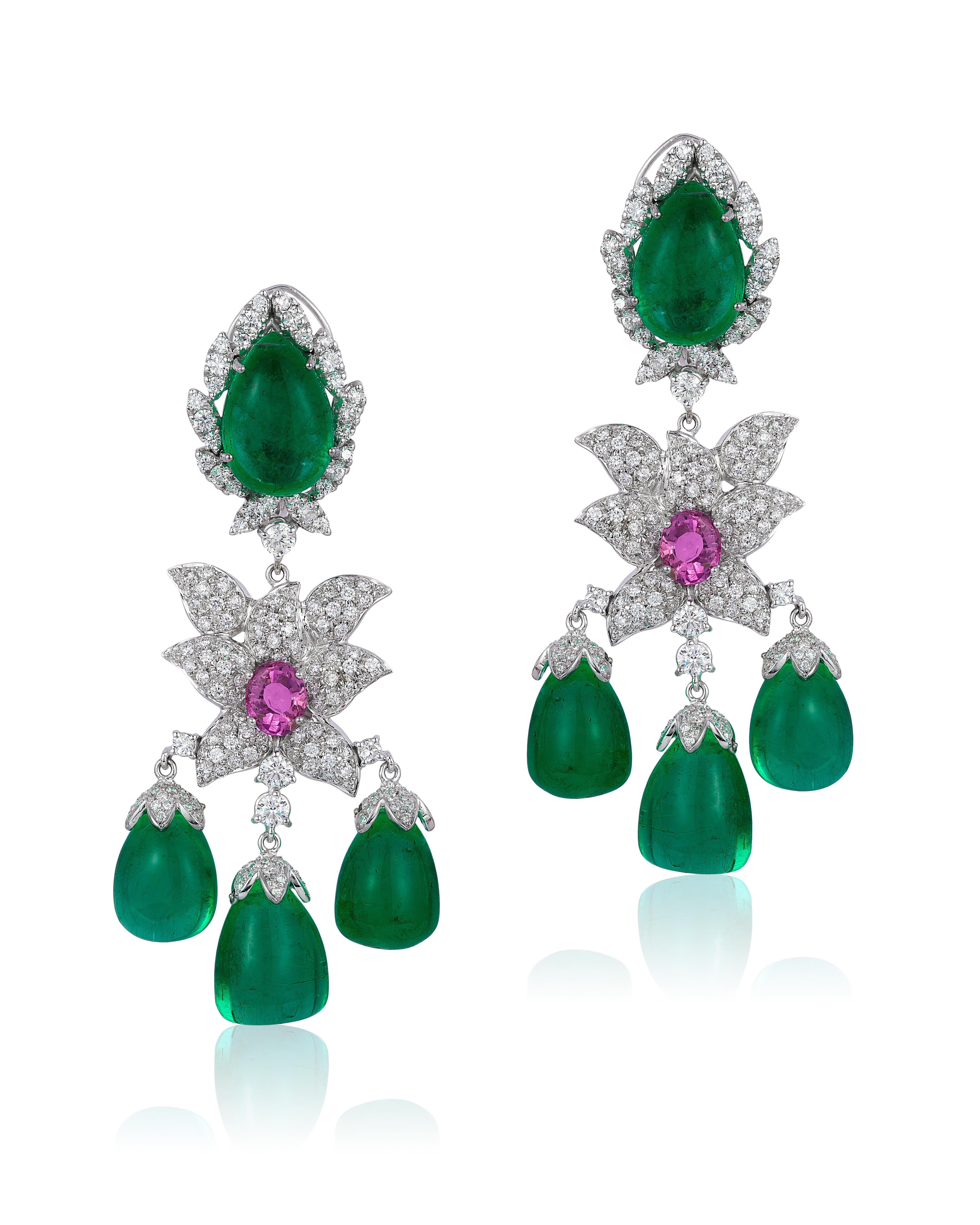 Andreoli Colombian Emerald Drop Pink Sapphire Diamond Chandelier Earrings 18K. These earrings feature 79.13 carats of colombian emerald cabochon drops surrounded with 5.39 carat of F-G-H Color VS-SI Clarity round brilliant diamonds. Two center pink