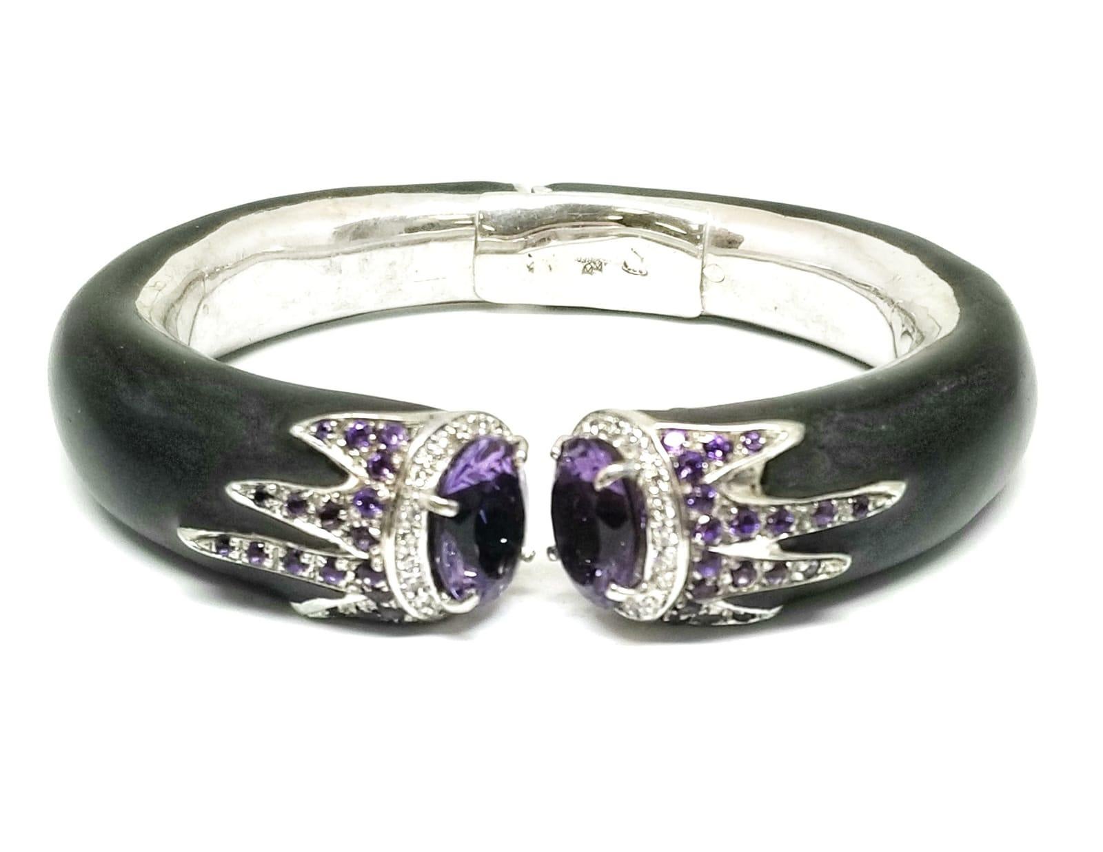 Andreoli Diamond Amethyst Black Enamel 18 Karat Gold and Silver Bracelet

This bracelet features:
- 0.62 Carat Diamond
- 8.02 Carat Amethyst
- Black Enamel
- 18K Gold & Silver
- Made In Italy