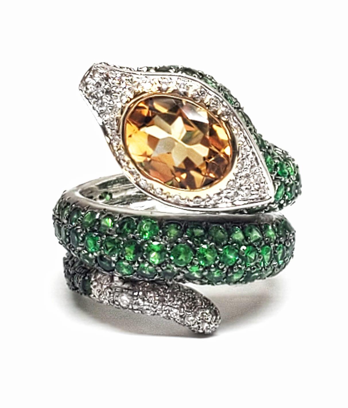 Andreoli Diamond Citrine Tsavorite 18 Karat White Gold Serpent Ring

This ring features:
- 0.49 Carat Diamond
- 1.95 Carat Citrine
- 5.76 Carat Tsavorite
- 19.90 Gram 18K White Gold
- Made In Italy