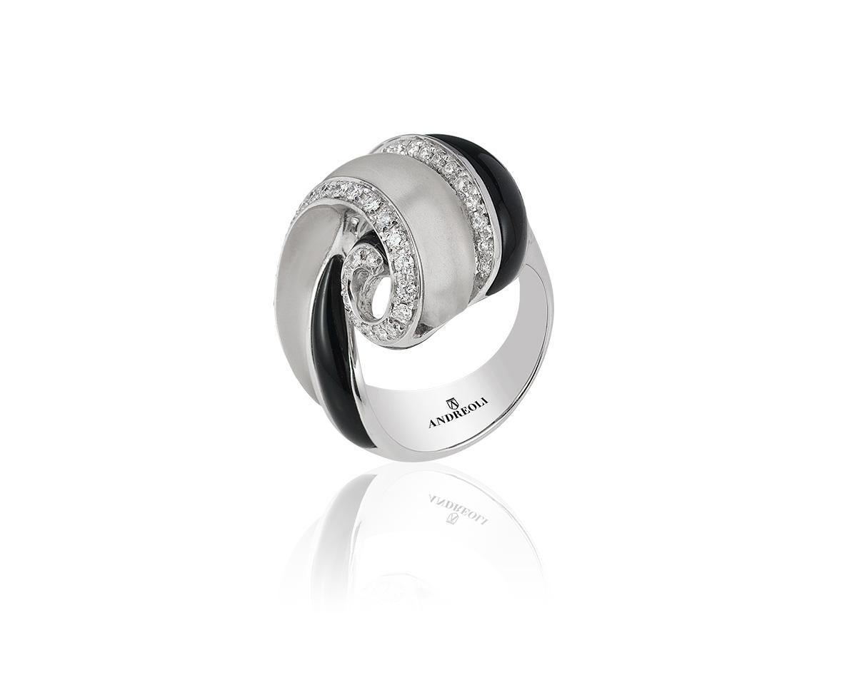 Andreoli Diamant Onyx Kristall 18 Karat Weißgold Ring

Dieser Ring hat folgende Merkmale:
- 0,60 Karat Diamant
- Onyx
- Kristall
- 15,50 Gramm 18K Weißgold
- Hergestellt in Italien