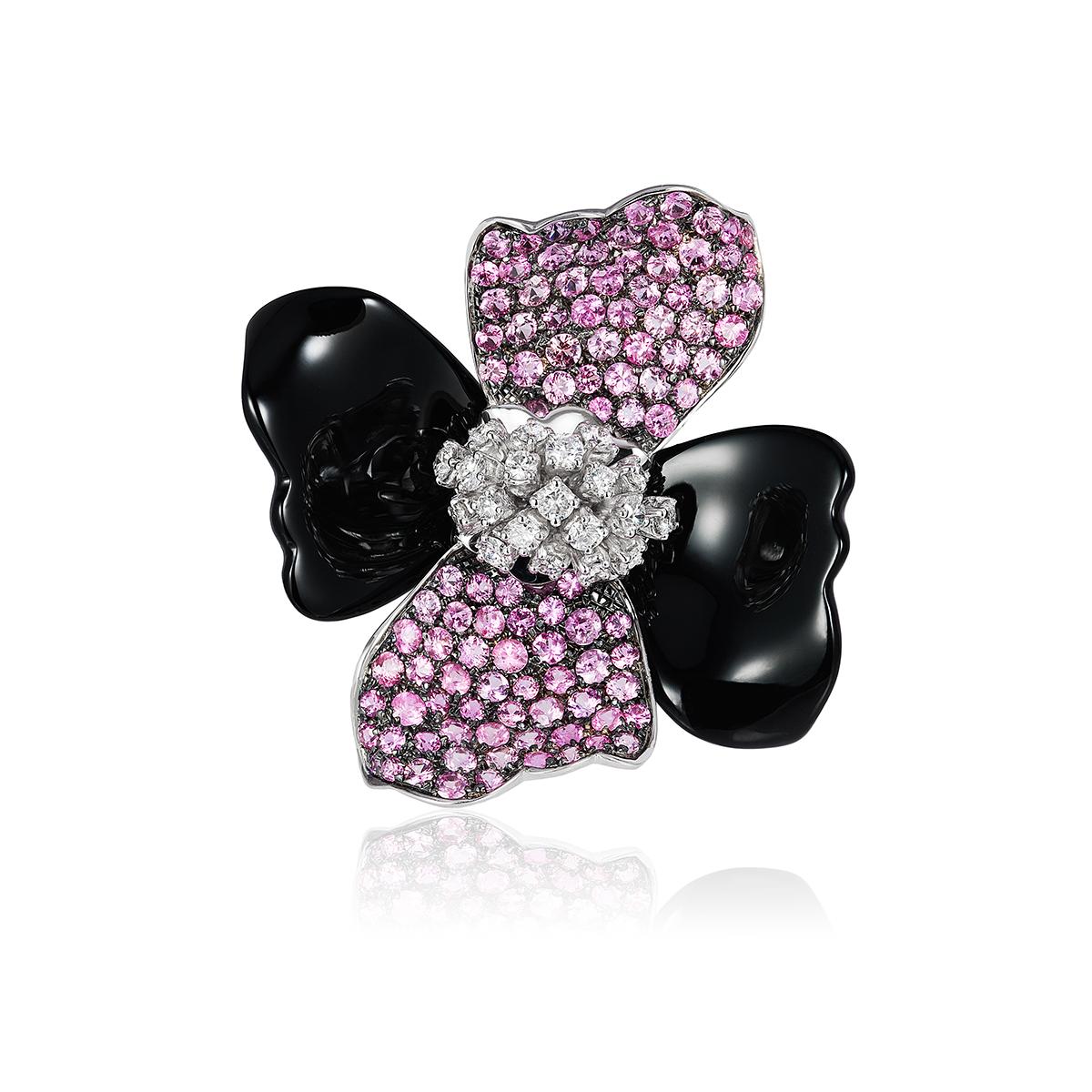 Andreoli Diamond Pink Sapphire Onyx Flower Cocktail Ring 18KT White Gold. This ring features 1.25 carats of full round brilliant cut Diamonds. The diamonds are F/G/H Color and VS-SI Clarity. This Andreoli ring is accented with 3.45 carats of full