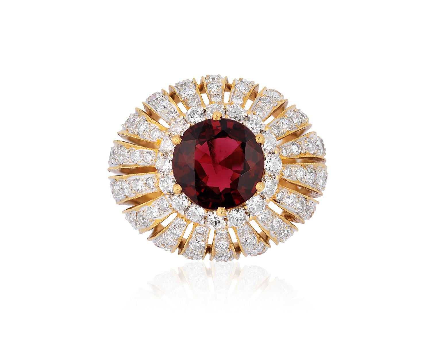 Andreoli Diamond Red Spinel Cocktail Ring 18KT Yellow Gold

This Andreoli ring features a 4.30 carat Round Red Spinel accented with numerous full cut round brilliant diamonds weighing 6.70 carats of F/G/H Color and VS-SI Clarity Round Diamonds. The