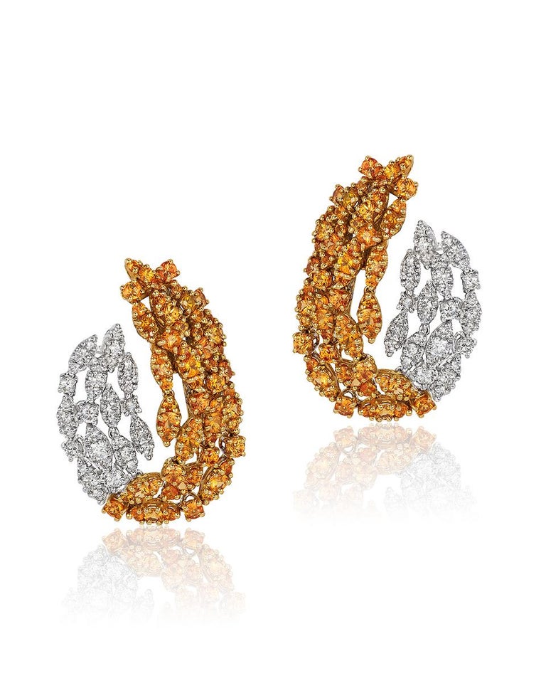 Andreoli Diamond Yellow Sapphire Clip Earrings 18 Karat Gold . These earrings feature 9.14 carat of round yellow sapphires and 2.89 carat of round brilliant cut diamonds. Set in 18 Karat White and Yellow Gold.  Meticulously designed and handcrafted