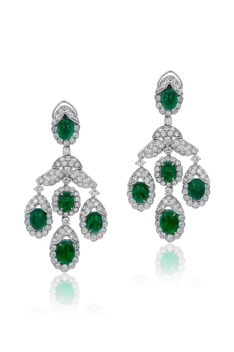 Andreoli Emerald Cabochon Diamond Chandelier Earrings 18 Karat White Gold. 

These earrings features:

9.62 carats of F-G-H Color, VS-SI Clarity Round Brilliant Cut Diamonds.
22.50 carats of Ten Emerald Cabochons
38.10 grams of 18 Karat White