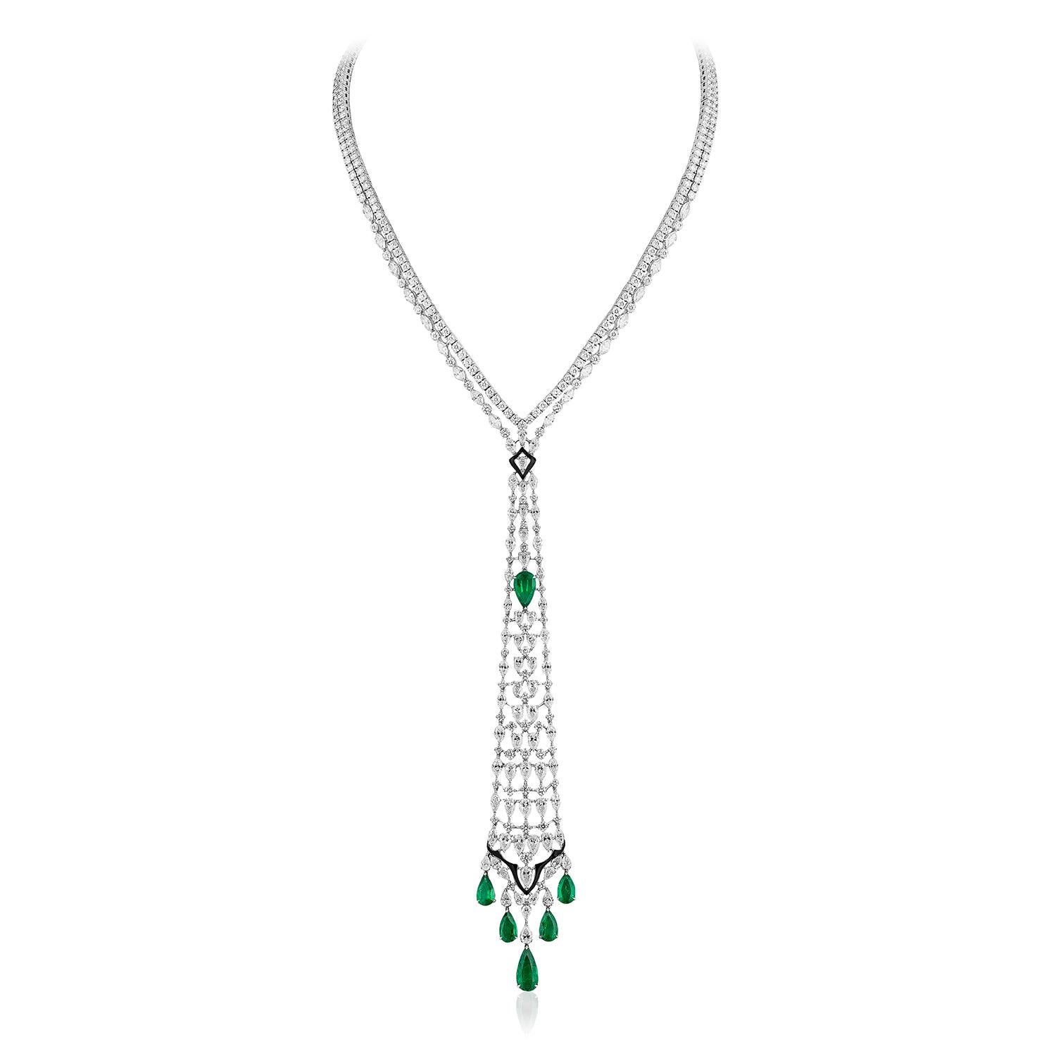 Andreoli Emerald Diamond Onyx 18 Karat White Gold Necklace

This necklace features:
- 11.40 Carat Round Diamond
- 13.62 Carat Pear Diamond
- 6.72 Carat Emerald
- Onyx
- 58.28 Gram 18K White Gold
- Made In Italy