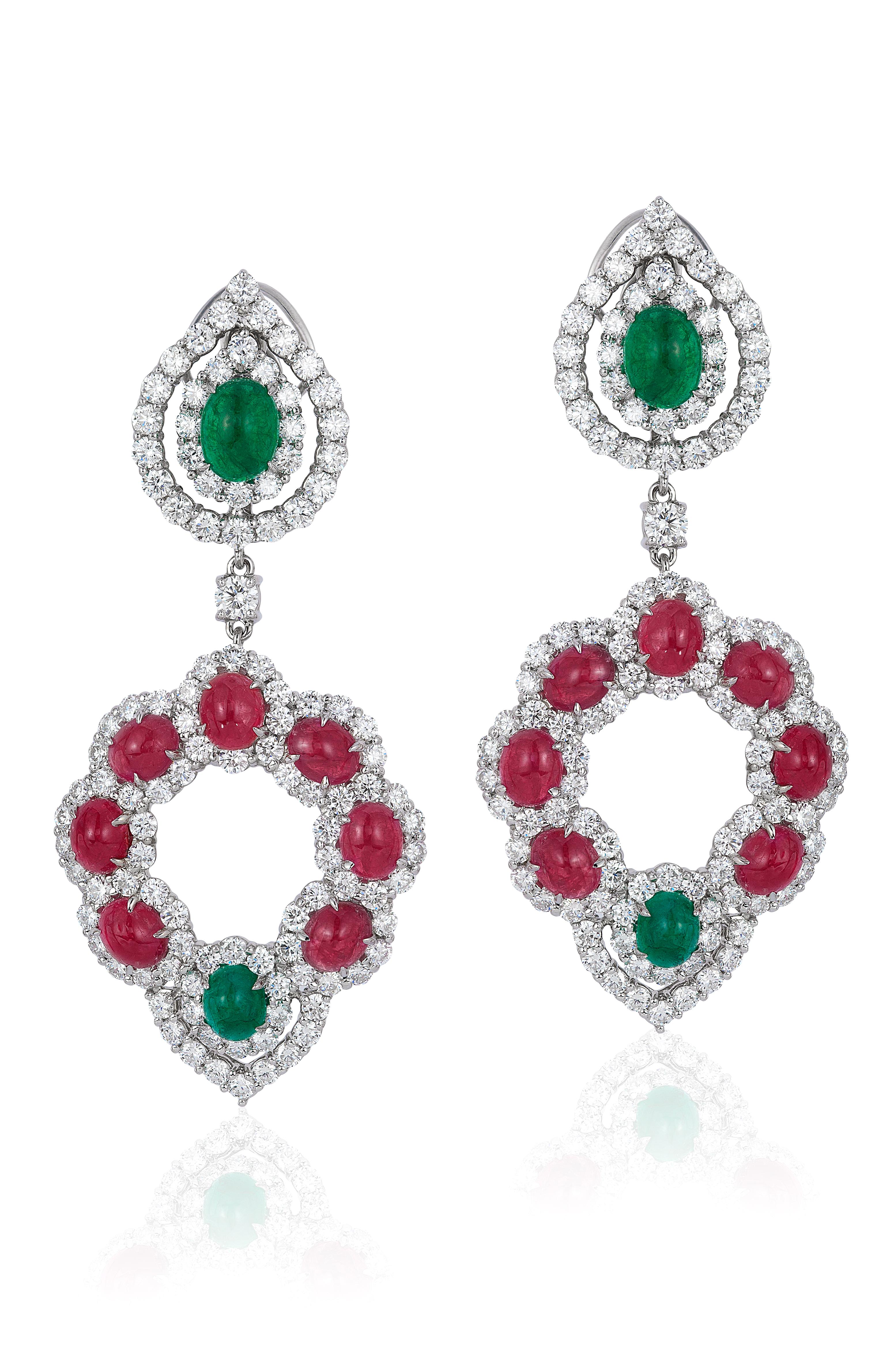 Andreoli Emerald Ruby Cabochon Diamond Chandelier Earrings 18 Karat White Gold

These earrrings feature:

9.38 carats of F-G-H Color, VS-SI Clarity round brilliant cut diamonds
4.40 carats of Four Emerald Cabochons
12.45 carats of 14 Ruby