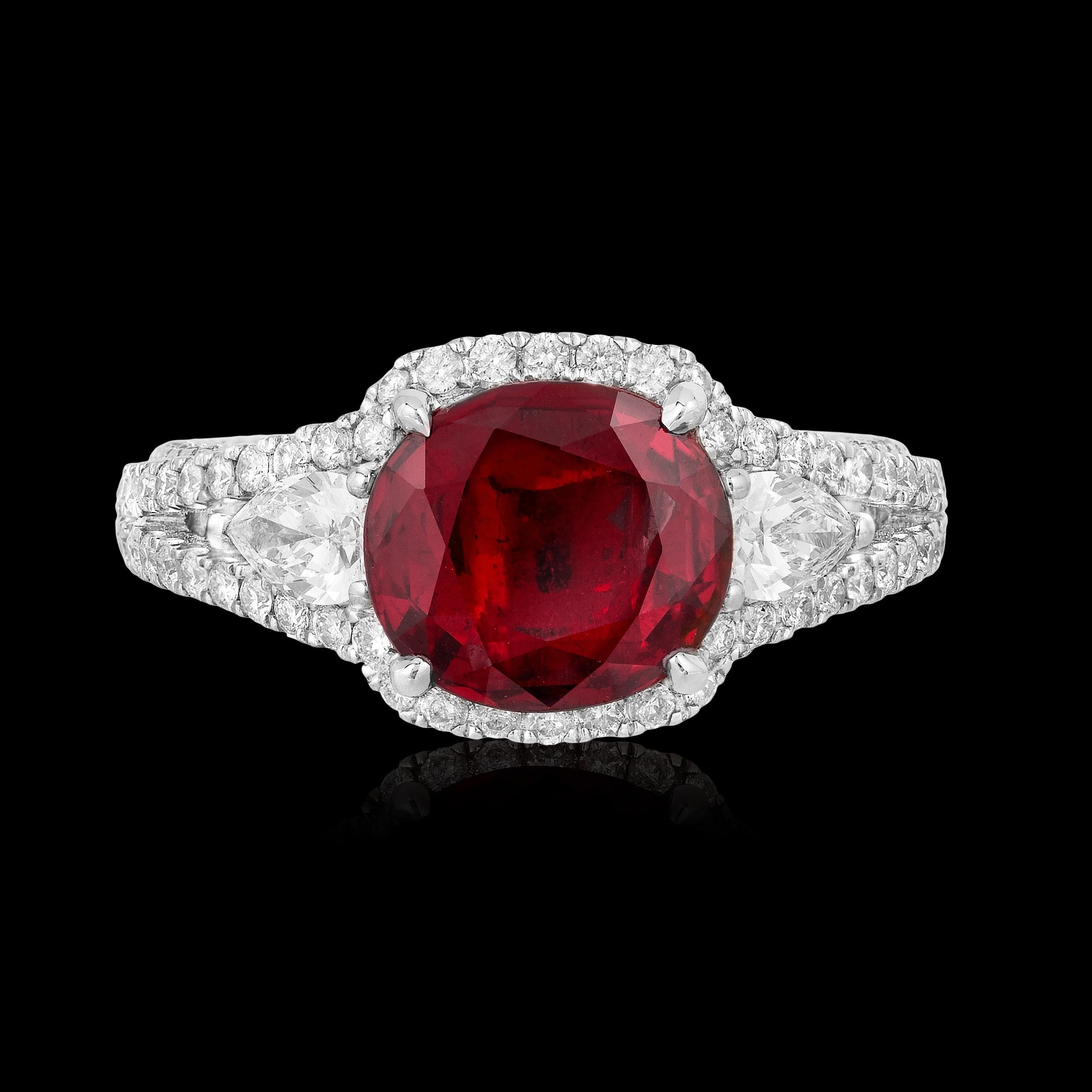 Andreoli GIA Certified 1.98 Carat Pigeon Blood Ruby Thailand Diamond Ring

This ring features a GIA Certified 1.98 Carat Pigeon Blood Thailand Origin Ruby. Accented with two near colourless pear shape, 0.41 carat, brilliant cut diamonds and numerous