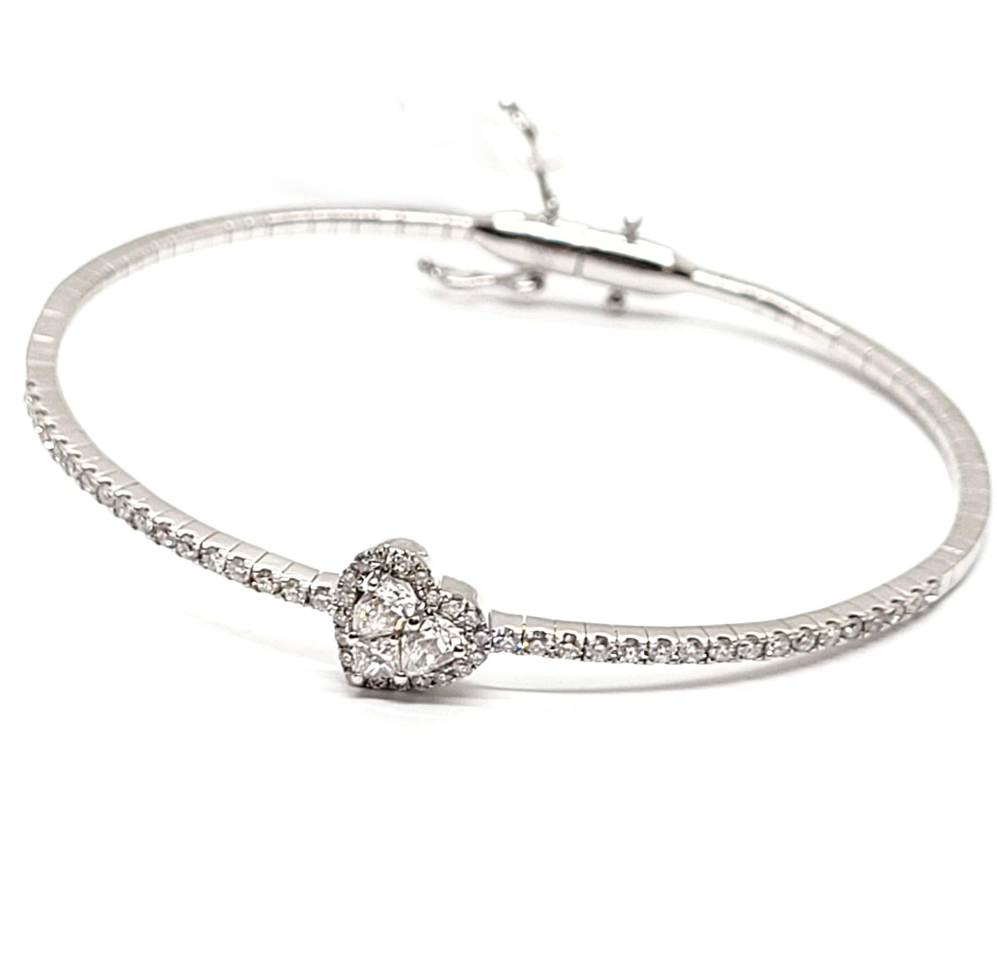 Andreoli Heart Shaped Invisible Diamond 18 Karat Gold Bangle Bracelet

This bracelet features:
- 0.77 Carat Diamond
- 7.99 g 18kt White Gold
- Made In Italy