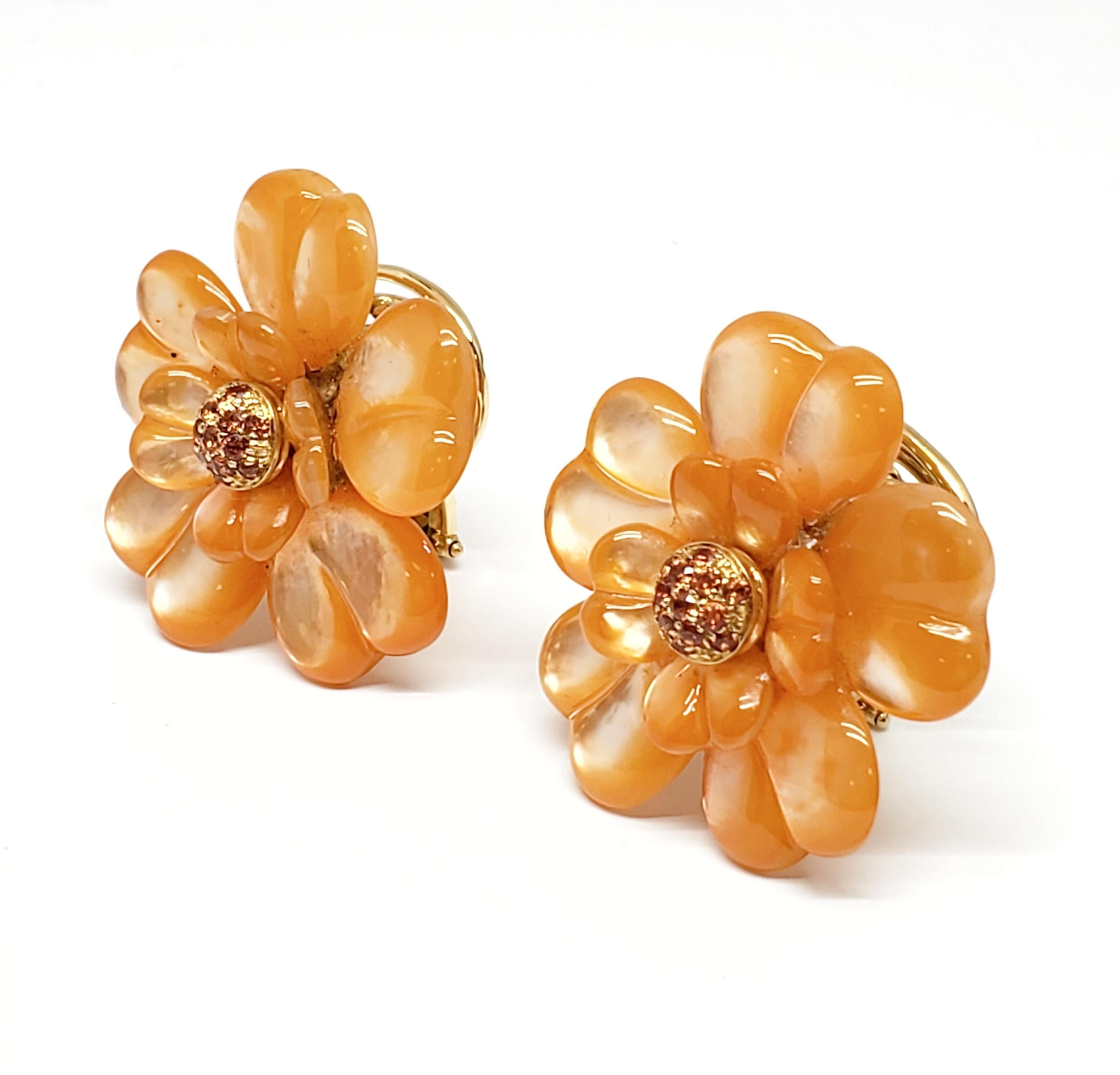 Andreoli Orange Dyed Mother of Pearl Orange Sapphire Cocktail Earrings Clips

These Andreoli Earrings Feature:

0.56 carat round orange sapphires
dyed orange mother of pearl
18.50 grams 18 karat yellow gold

Handcrafted and designed by Andreoli in