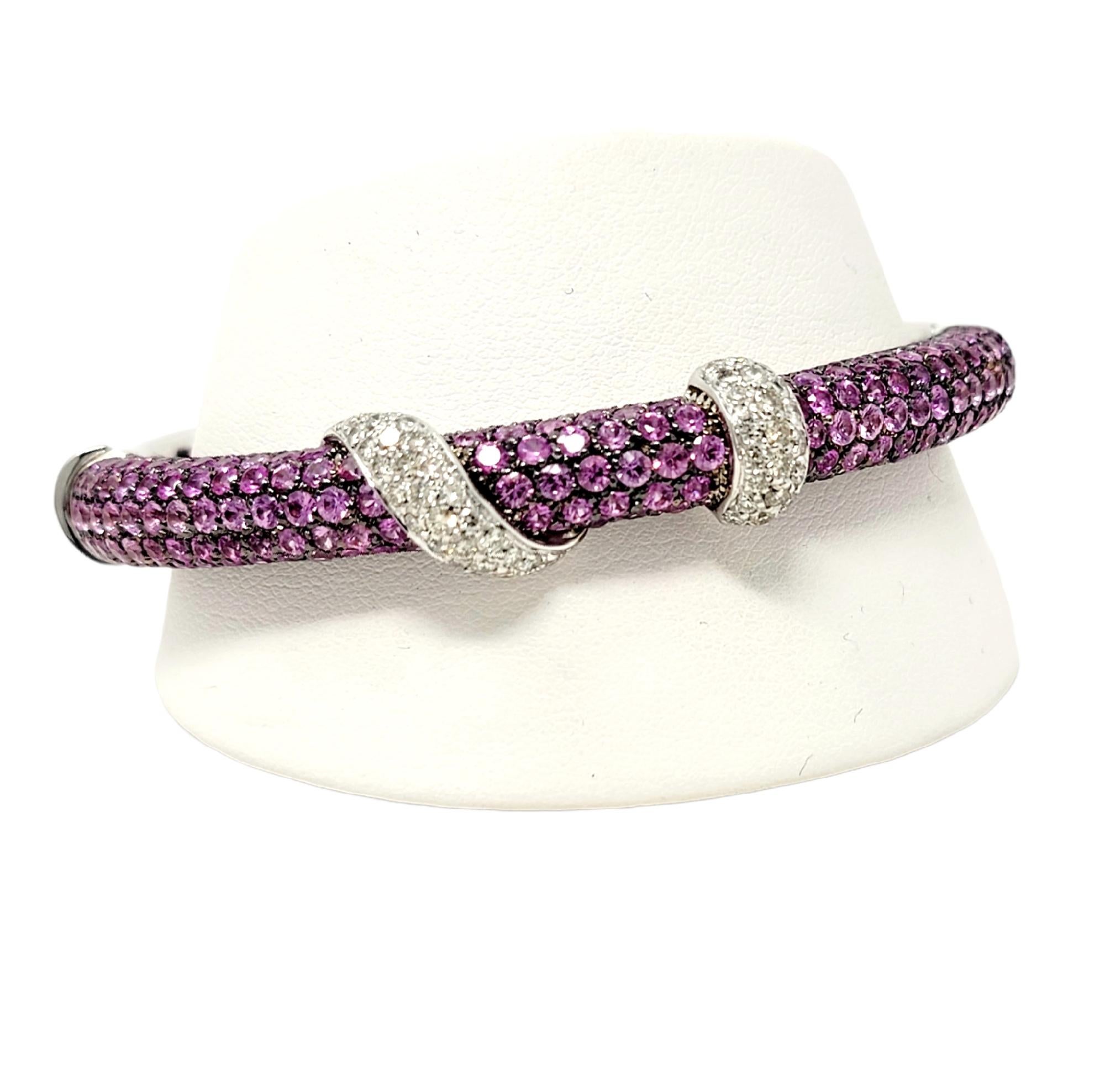 Ultra feminine bracelet by Italian designer Andreoli, featuring glittering pink sapphires and sparkling pave diamonds. This stunning bracelet has a contemporary feel with a sleek and elegant design. It features an impressive 221 round mixed cut