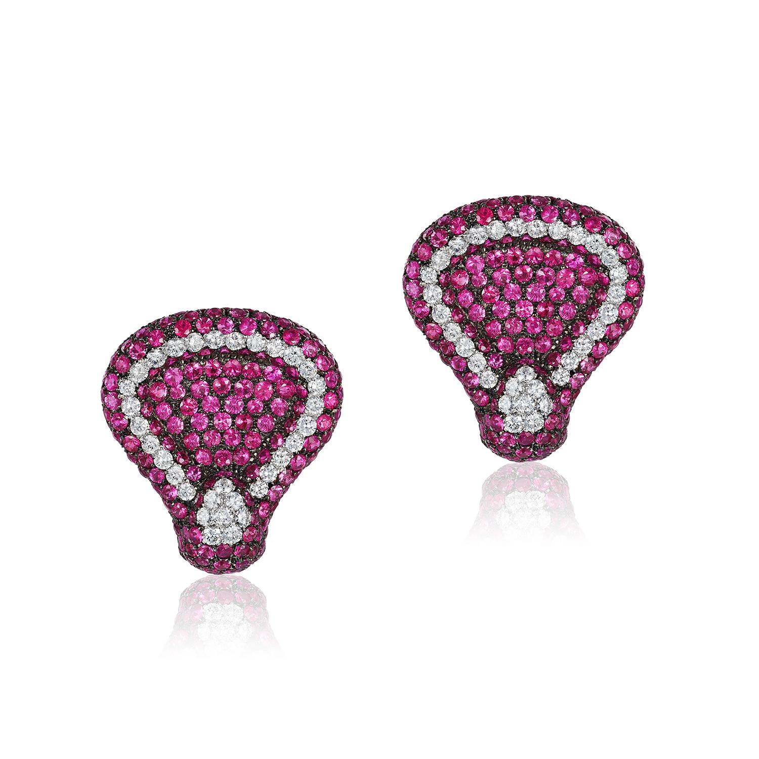 Andreoli Pink Sapphire Diamond On Ear Clip Earrings 18KT White Gold Blackened

These earrings feature 12.86 carats of full cut round Pink Sapphires accented by 2.37 carats of full cut round brilliant diamond  F/G/H Color VS-SI Clarity. set in 30.70