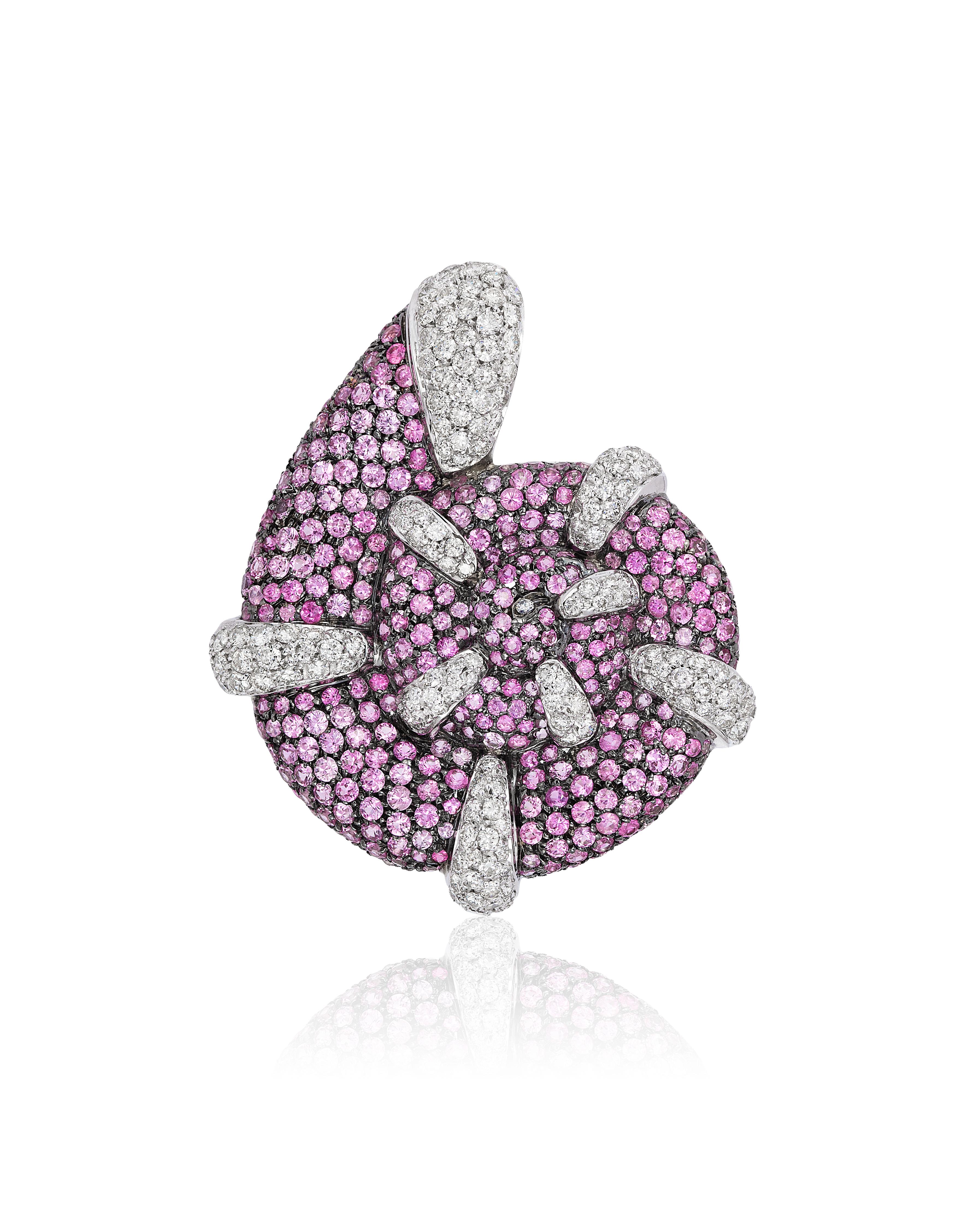 Andreoli Pink Sapphire Diamond Seashell Seahorse Brooch Pin 18 Karat White Gold. This brooch features 3.95 carats of F-G-H Color VS-SI Clarity brilliant cut diamonds and 8.73 carats of round pink sapphires. Set in 30.90 grams of 18 karat white gold.