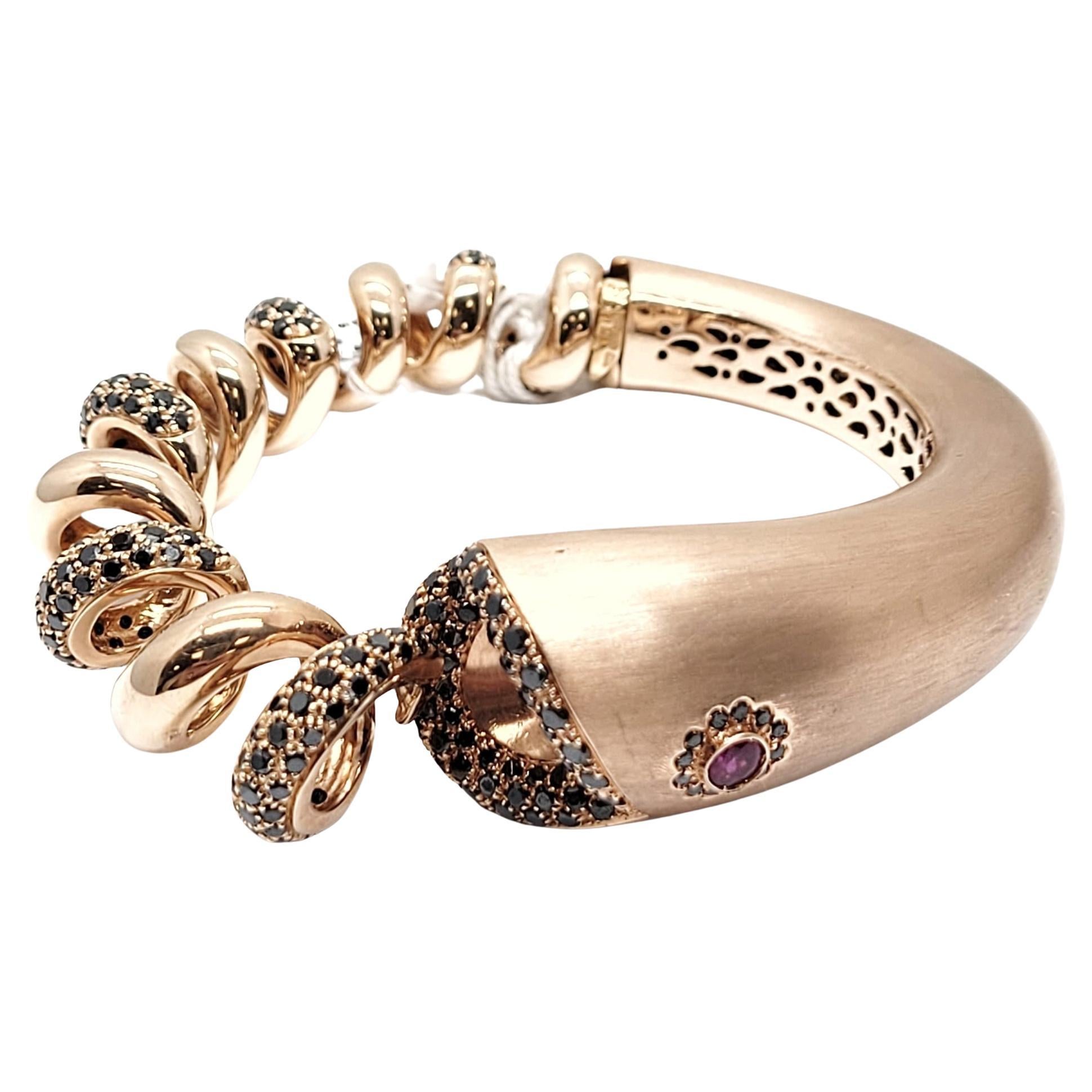 Andreoli, bracelet serpent en or rose 18 carats, rubis et diamants noirs