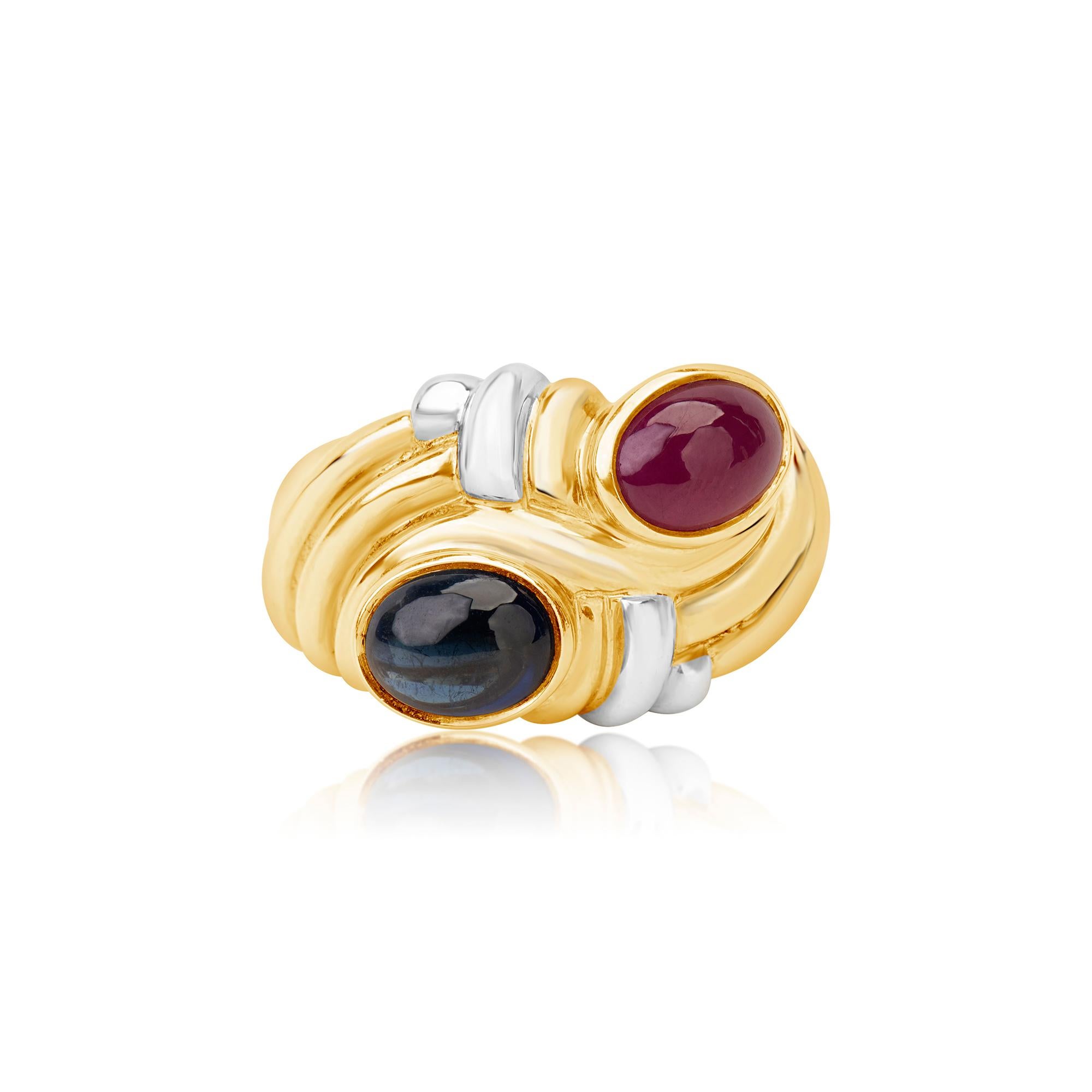 Andreoli Sapphire Ruby 18 Karat Two-Tone Gold Ring

This ring features:
- 2.84 Carat Blue Sapphire
- 2.34 Carat Ruby
- 20.86 Gram 18K Two-Tone Gold
- Made In Italy