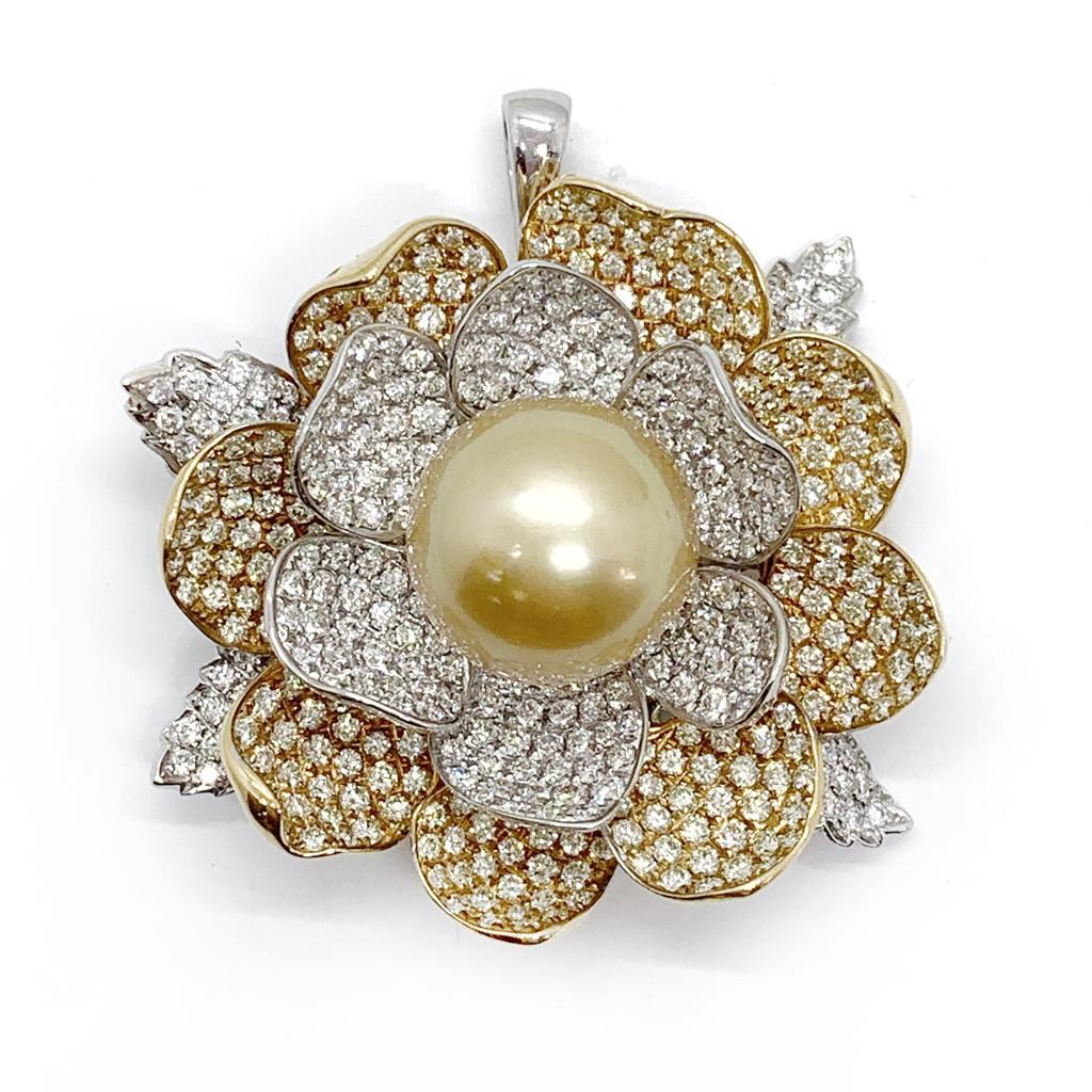 Andreoli: 18 Karat Gold 2-in-1 Ring und Anhänger mit Südseeperlen und Diamanten

Dieser Ring/Anhänger hat folgende Merkmale:
- 2,26ct Runder Diamant
- 2,74ct Gelber Diamant
- 16,49ct Südsee Perle
- 22,59g 18kt Gelb- und Weißgold
- Hergestellt in