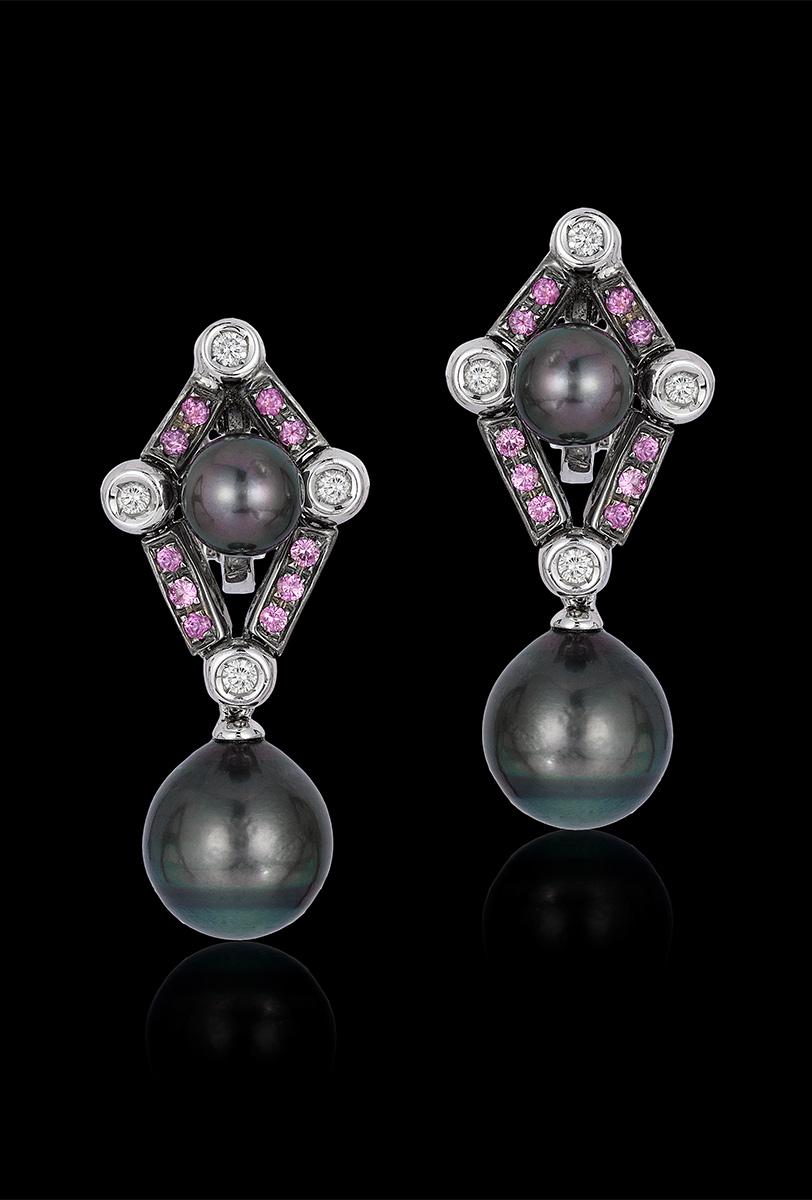 Andreoli Tahitian Pearl Diamond Pink Sapphire Drop Clip Dangling Earrings 

These Andreoli earrings feature 0.49 carate of full cut round brilliant diamonds F/G/H Color VS-SI Clarity. 0.73 carats of full cut round Pink Sapphires set in 14.10 grams