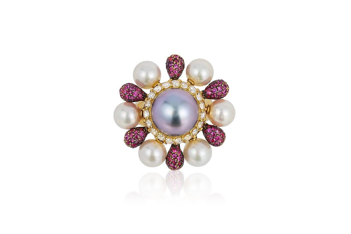 Andreoli Tahitian Pearl Diamond Pink Sapphire Flower Movable Petal Ring Cocktail. This ring features a 13mm Tahitian Center Pearl. Accented with 2.14 carats of Round pink sapphires and 1.12 carats of full round ideal cut brilliant diamonds. F/G/H