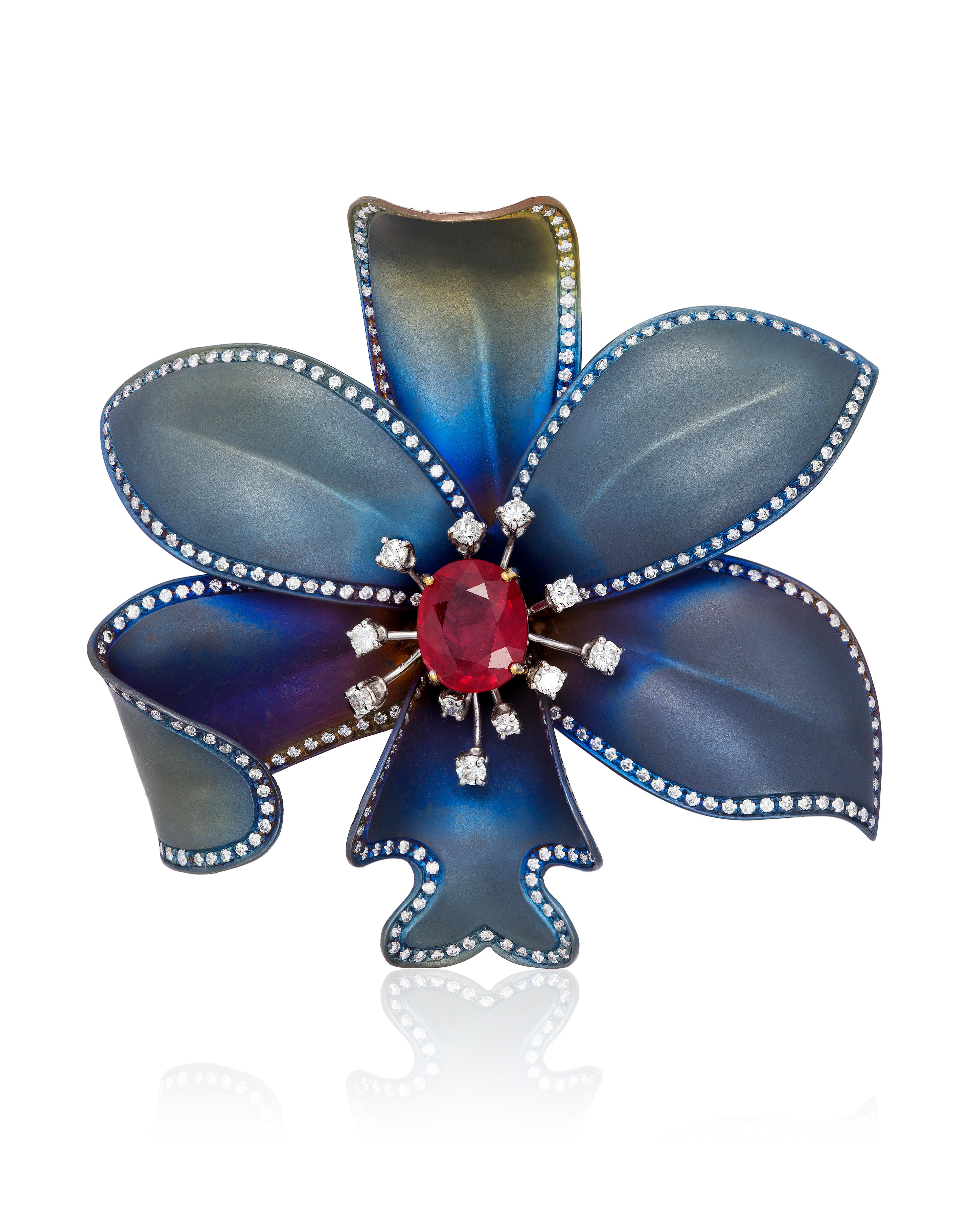 Andreoli Titanium Ruby Diamond Flower Brooch Pin . Andreoli was one of the first jewelry creators to utilize titanium in high jewelry over 18KT or Platinum. The use of titanium allows for bigger and bolder designs without compromising on the weight